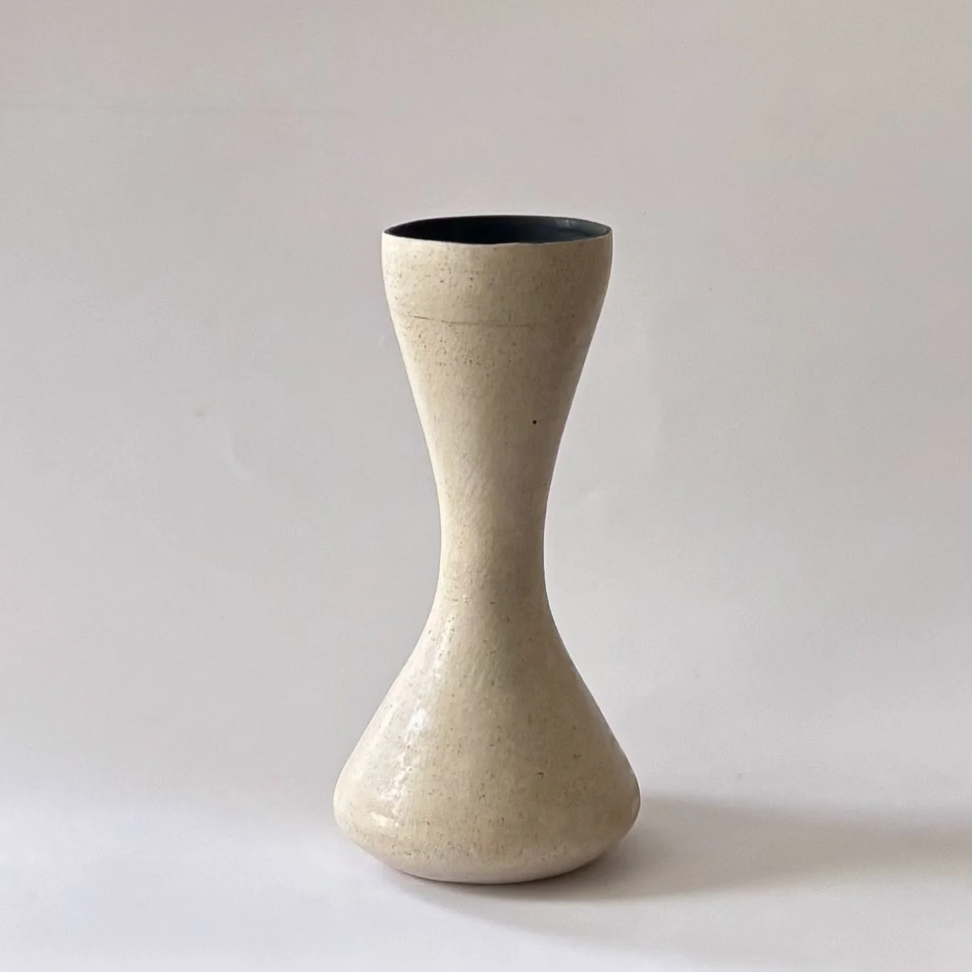 bone hourglass vase