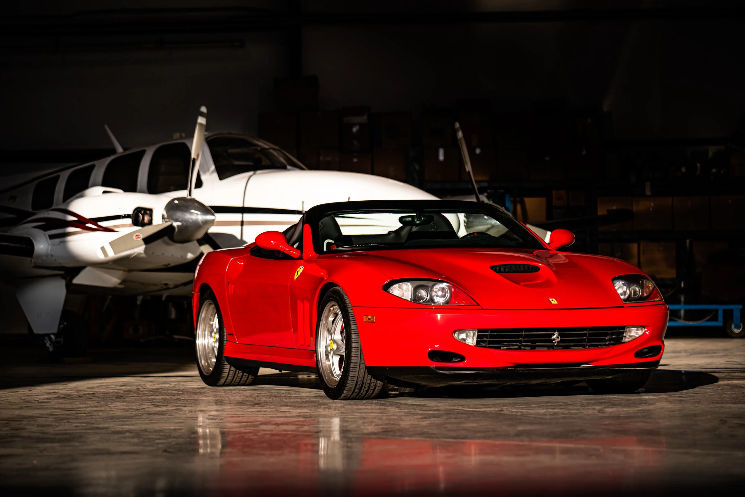 Automotive Photography Ferrari 550 Marranello Spyder in front of airplane by David Loi