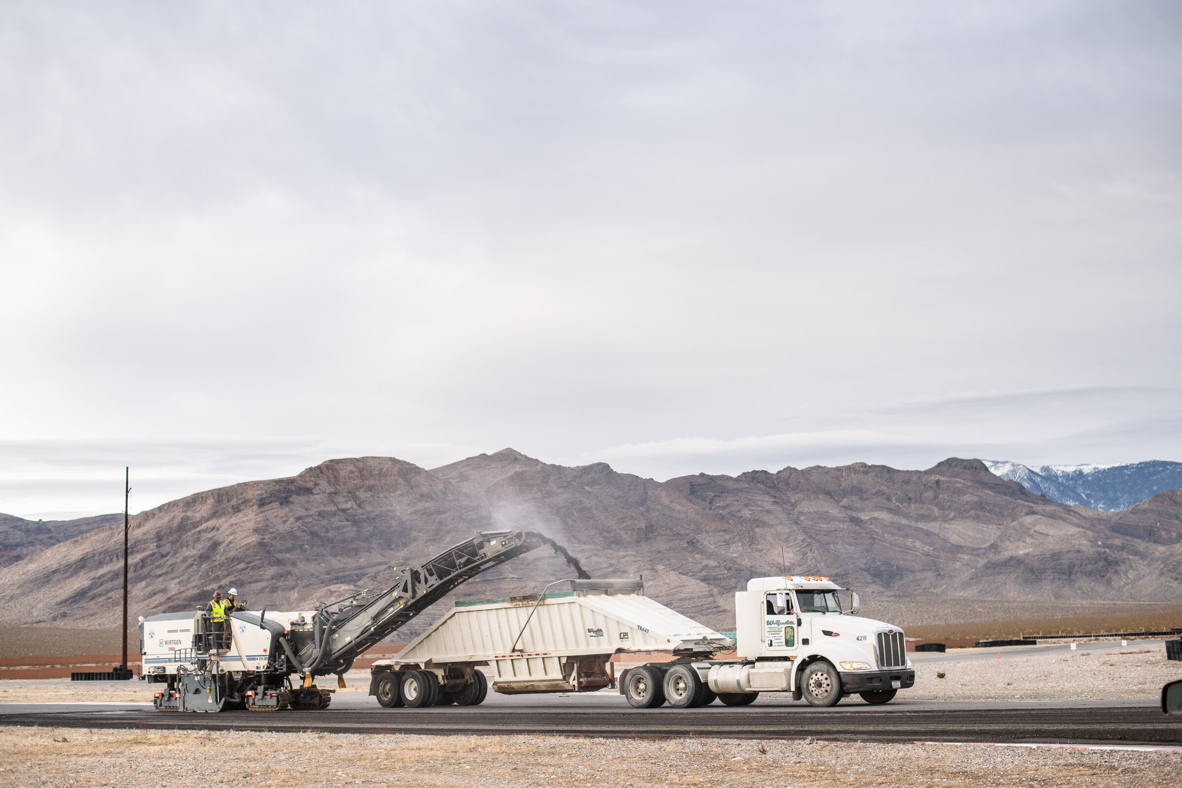 Commercial Photography to show concrete getting poured at Spring Mountain Motorsports Ranch in Las Vegas, NV by David Loi 