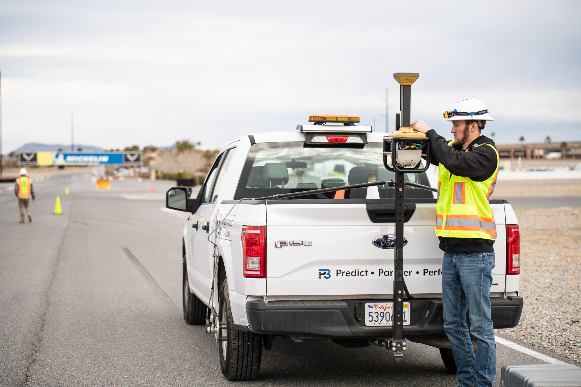 Commercial Photography for Topcon Laser Scanner being setup on the back of a truck at the Spring Mountain Motorsports Ranch in Las Vegas, NV by David Loi
