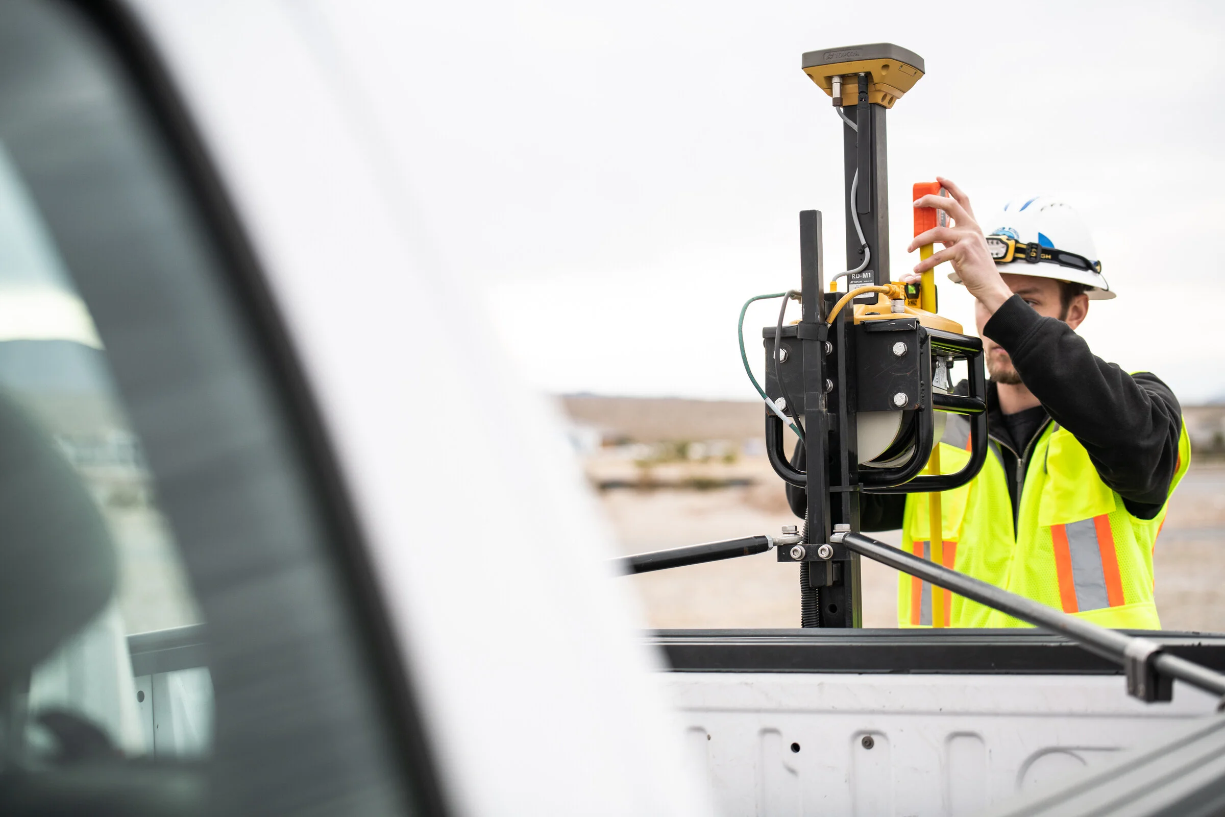 Commercial Photography for Topcon Laser Scanner being setup on the back of a truck at the Spring Mountain Motorsports Ranch in Las Vegas, NV by David Loi