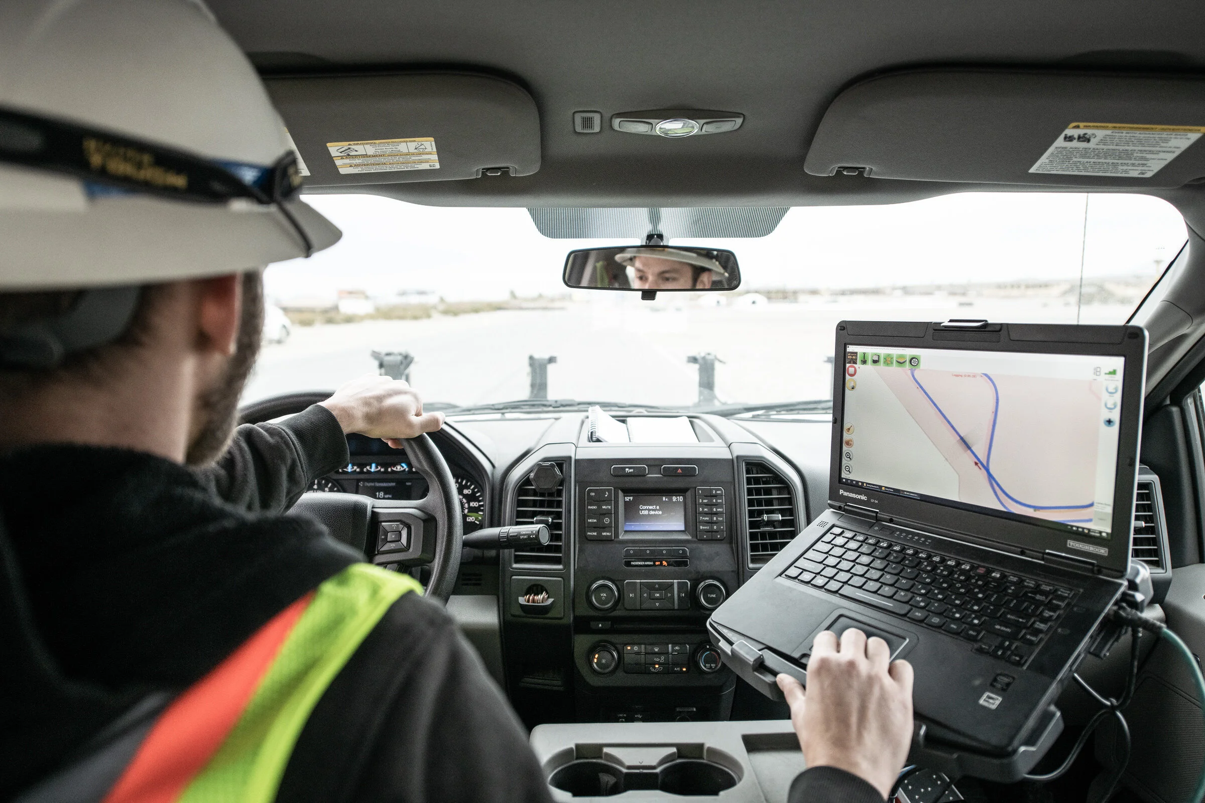 Commercial Photography for an operator works a laptop by David Loi