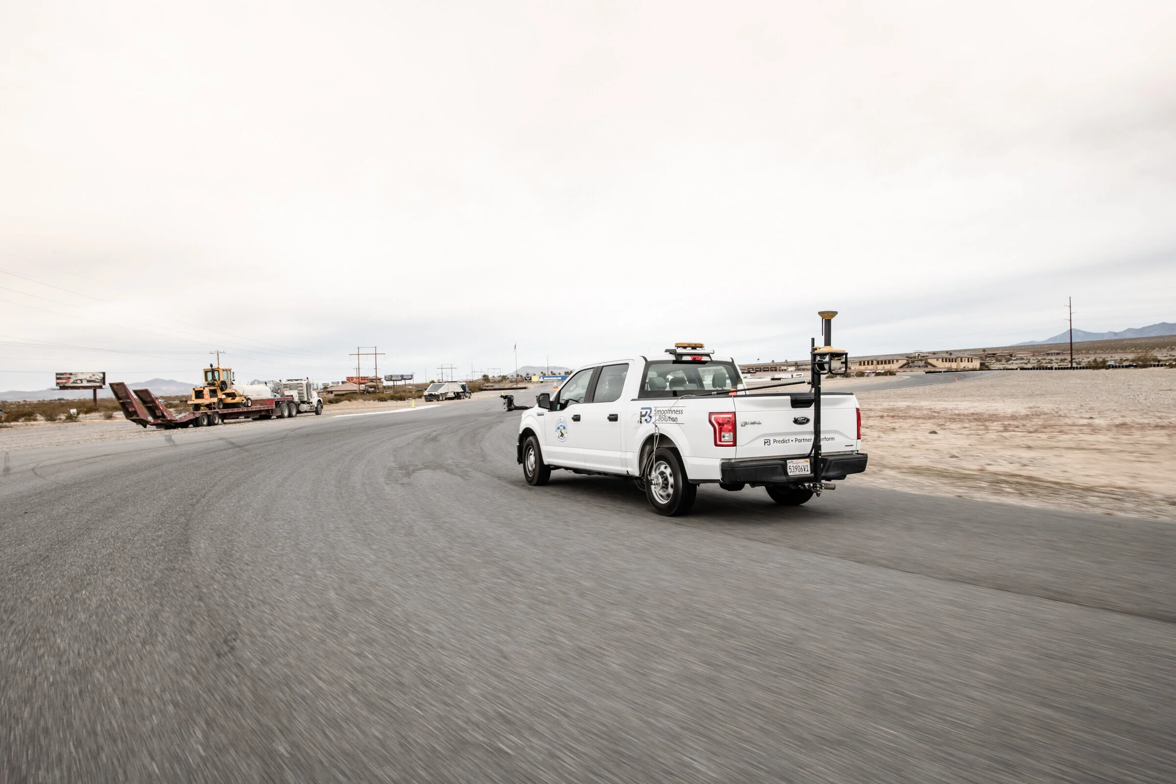 Commercial Photography for Topcon Laser Scanner being setup on the back of a truck at the Spring Mountain Motorsports Ranch in Las Vegas, NV by David Loi