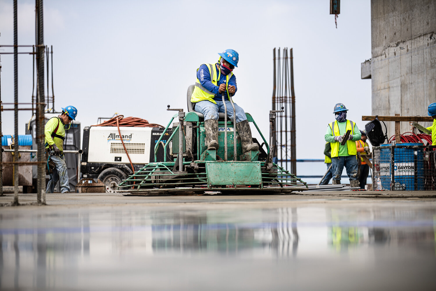 Commercial photography with TAS Concrete smoothing new concrete by David Loi