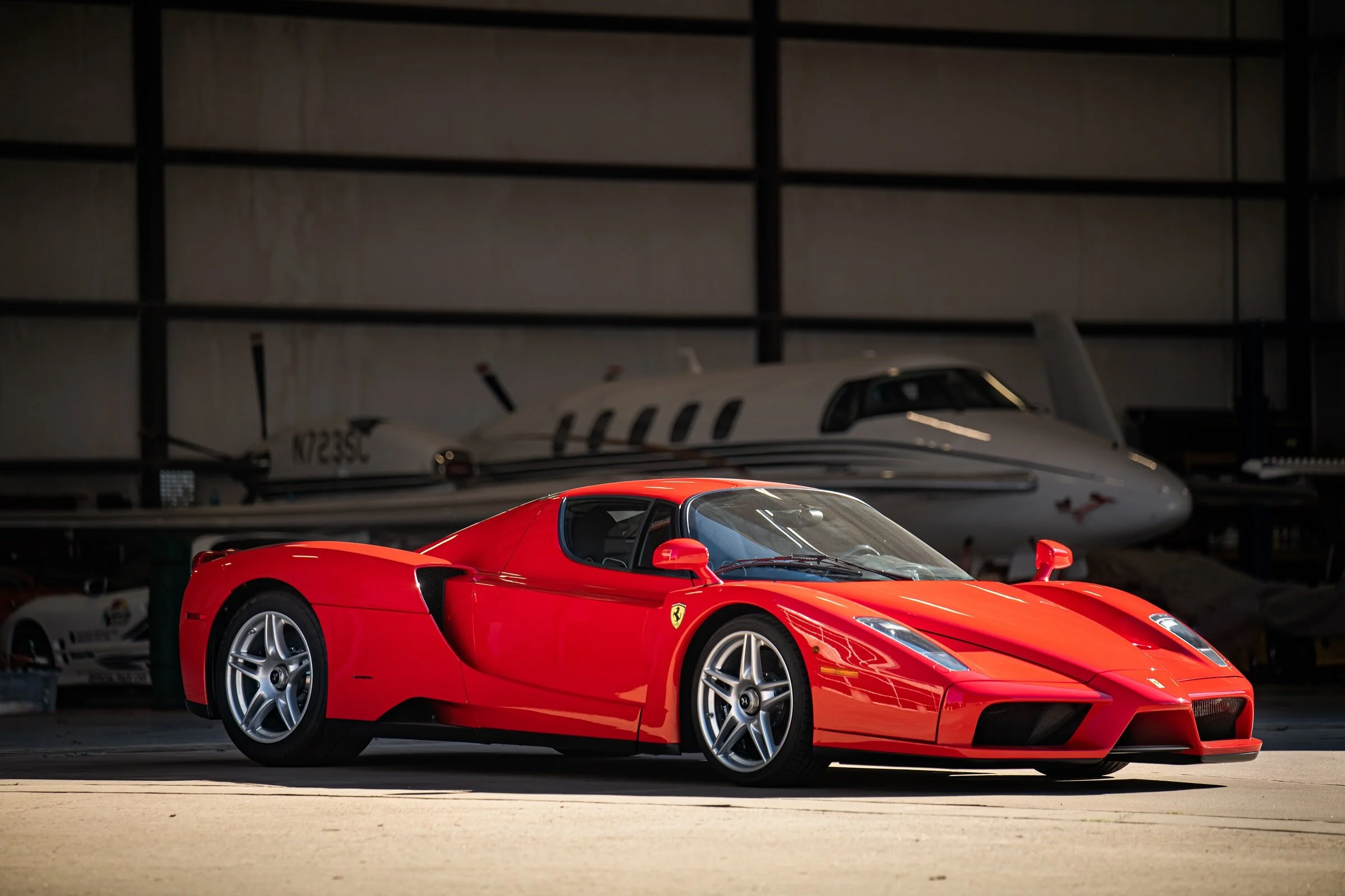Automotive Photography Ferrari Enzo in front of Beechcraft Starship by David Loi