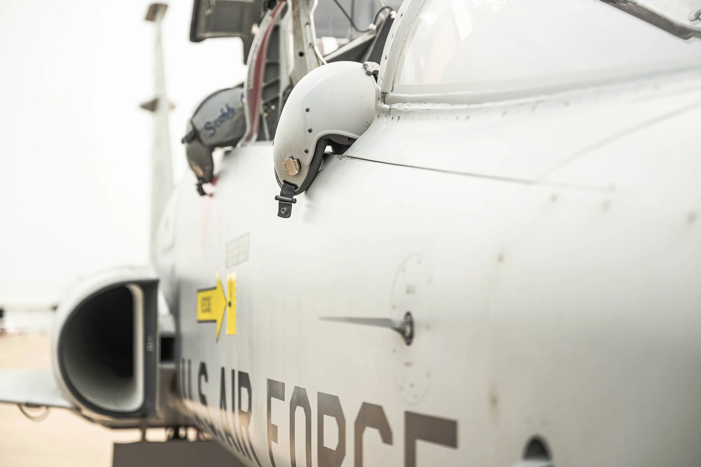 Helmets sitting on the cockpit of the F5B Freedom Fighter at Alliance Airport in Ft. Worth Texas.