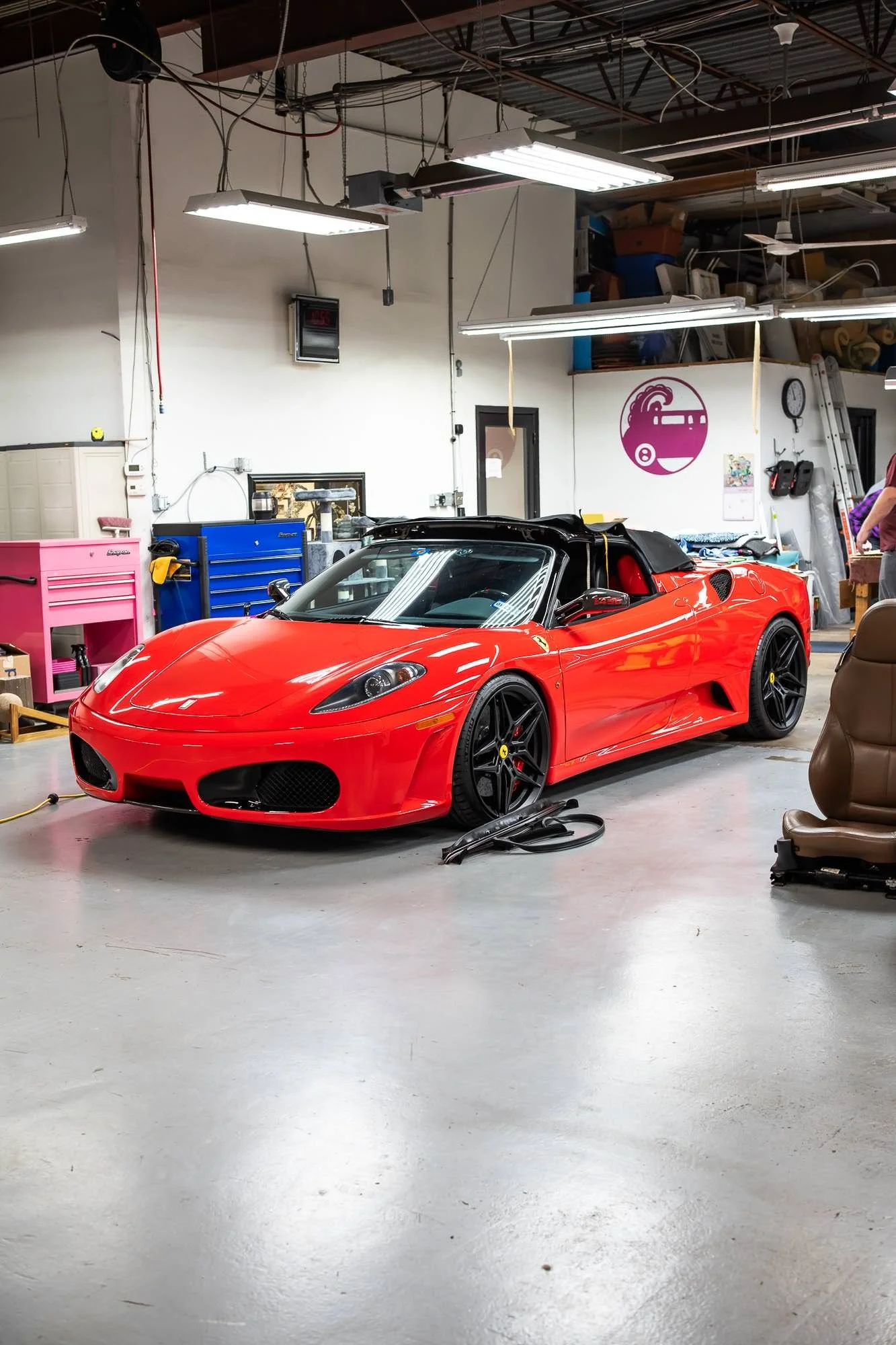 Ferrari F430 sports car awaiting upholstery work at Tin Lizzie Affairs, by David Loi Studios.