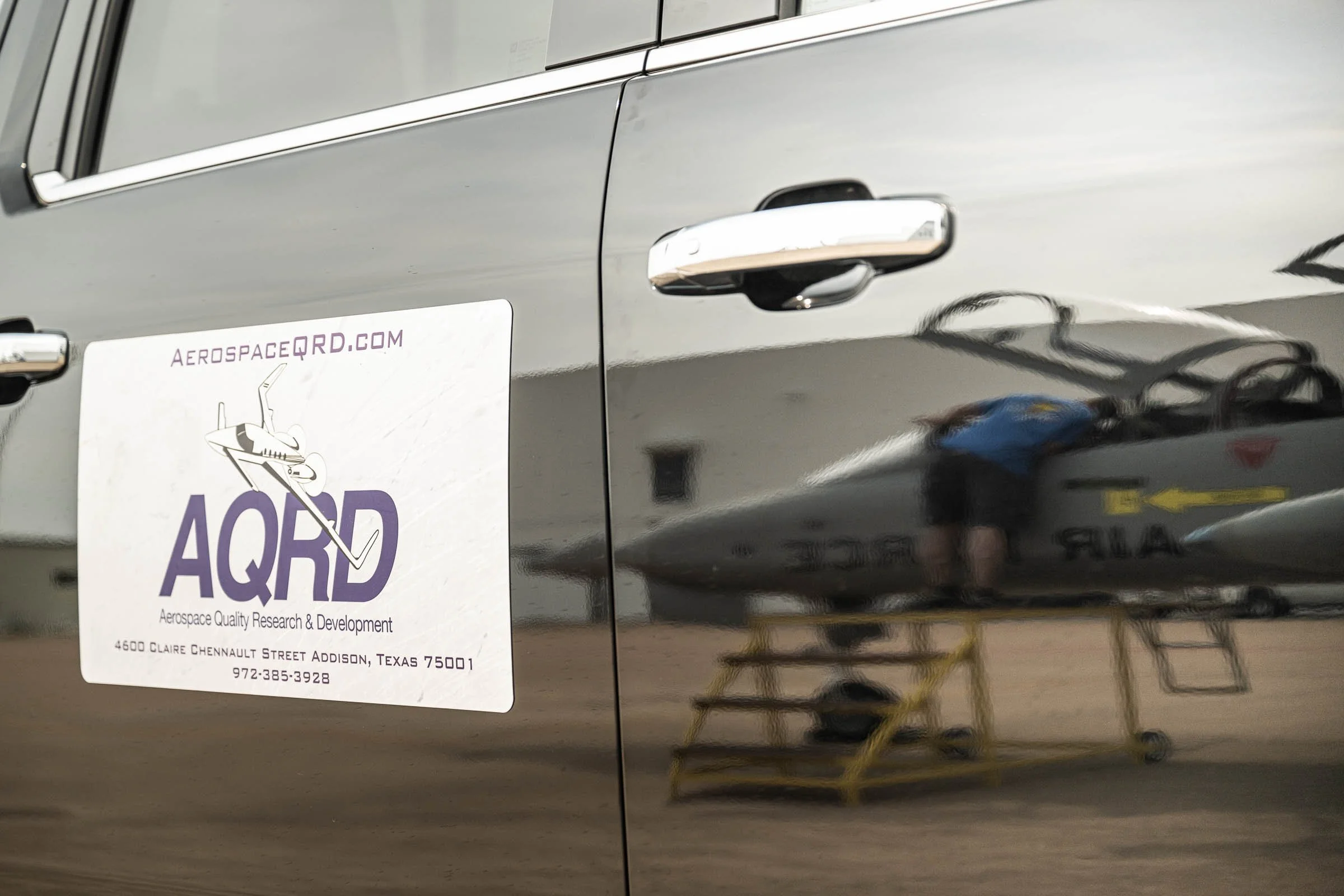 A reflection of the F5B Freedom Fighter against the AQRD maintenance vehicle at Alliance Airport (AFW) in Ft Worth, TX