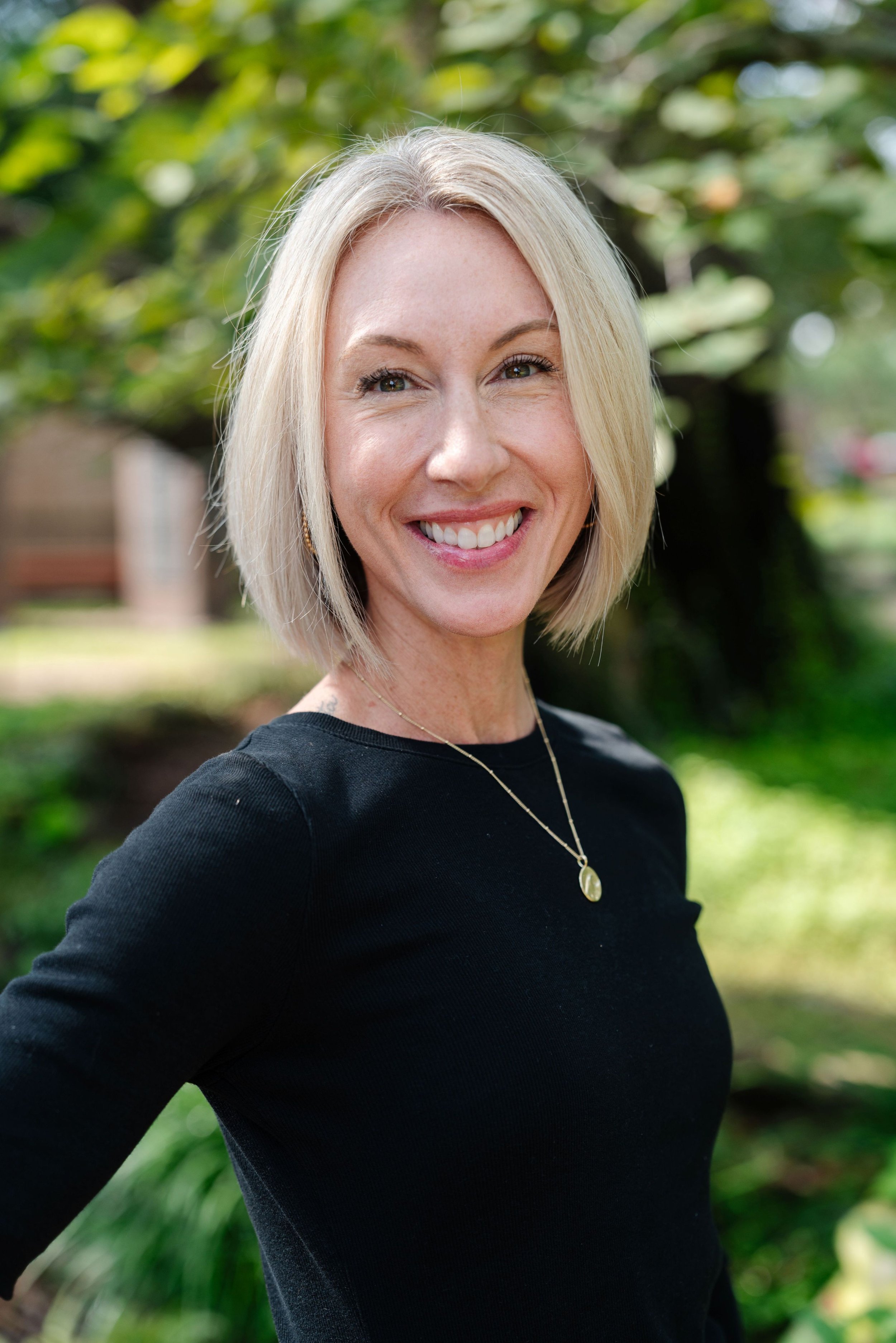 Ashley Schmidt, Assistant Director
