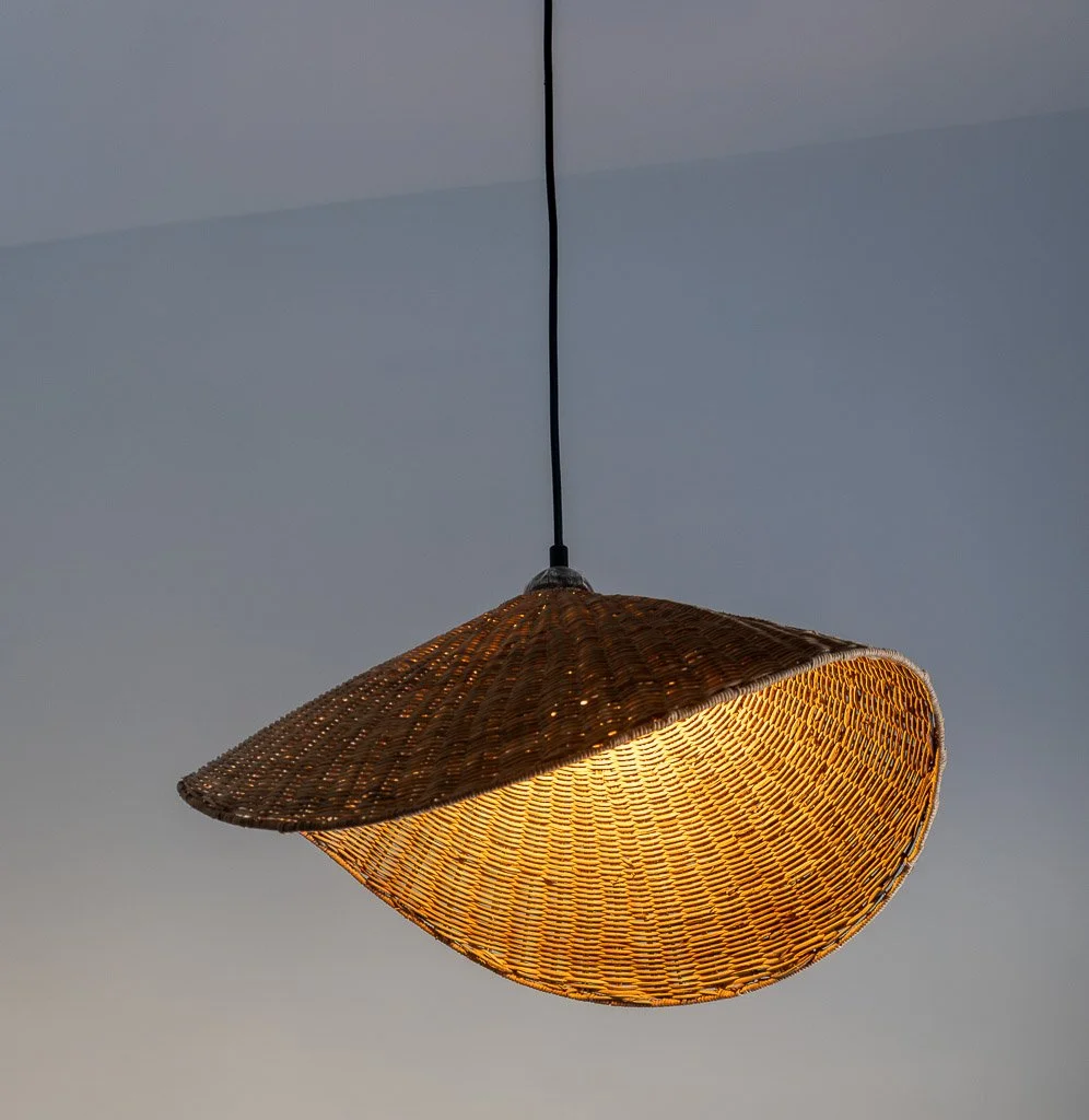 Bedroom pendant light with basket weave in the Downtown Luxury Condo at Hotel Thaxter in Portsmouth, New Hampshire.