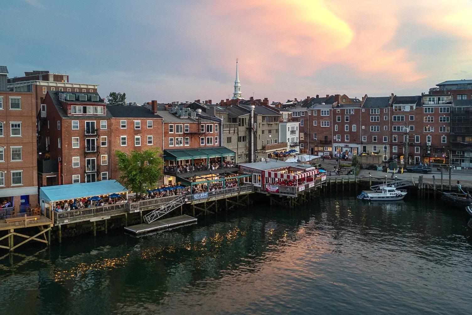 Sunset view of downtown Portsmouth, New Hampshire waterfront near Hotel Thaxter.