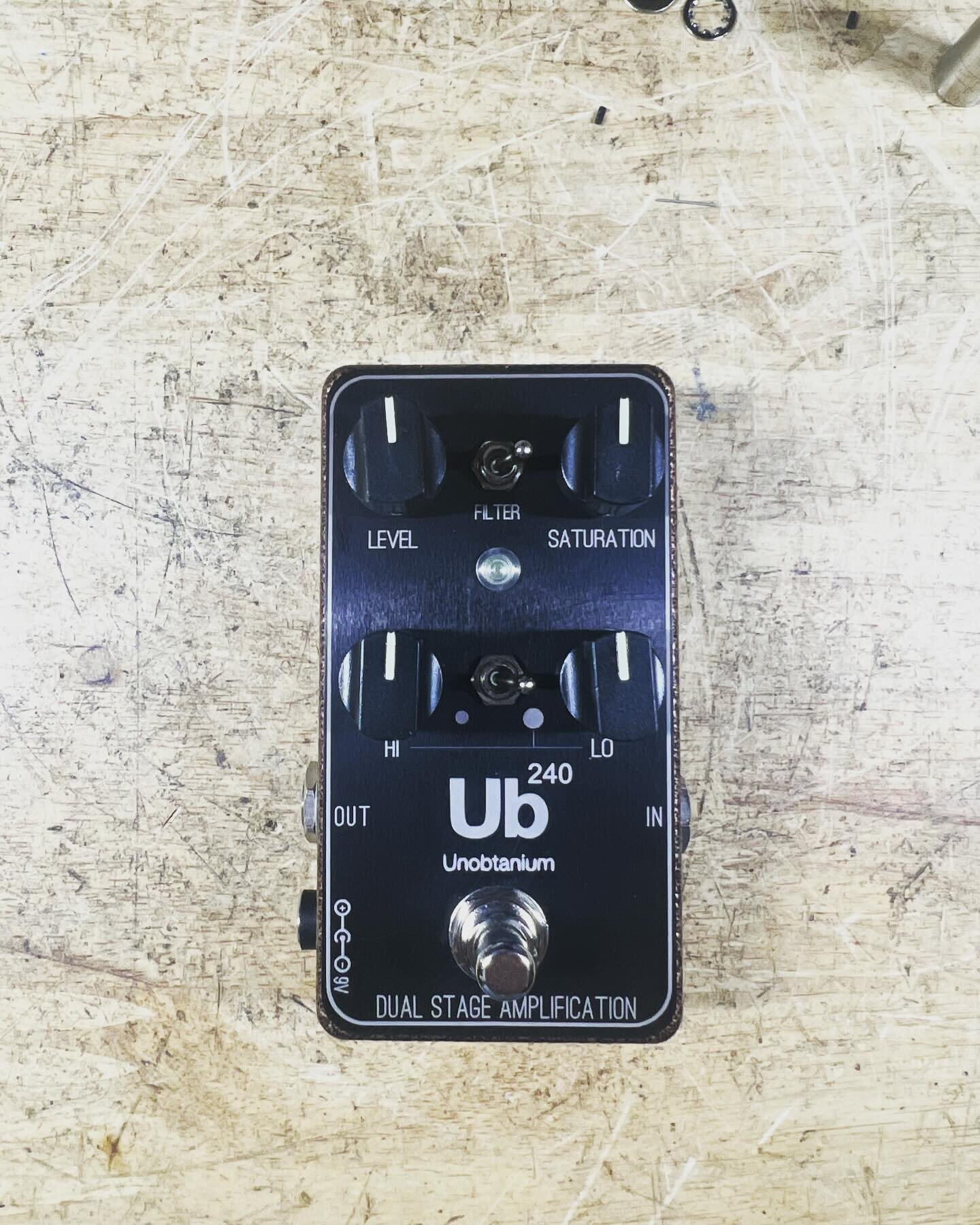 Serial 001 of The Unobtainium 240! A unique double fuzz circuit for the ages. Inside this lasered black anodized aluminum and copper hammer tone enclosure is the a finely tuned version of the famous Shin-ei Superfuzz and at the flick of a switch, com