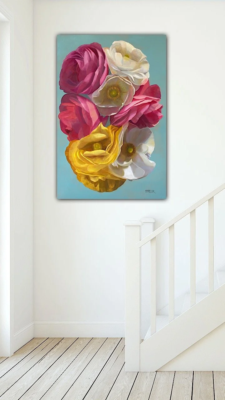 Painting of colorful flowers on a wall above a staircase.