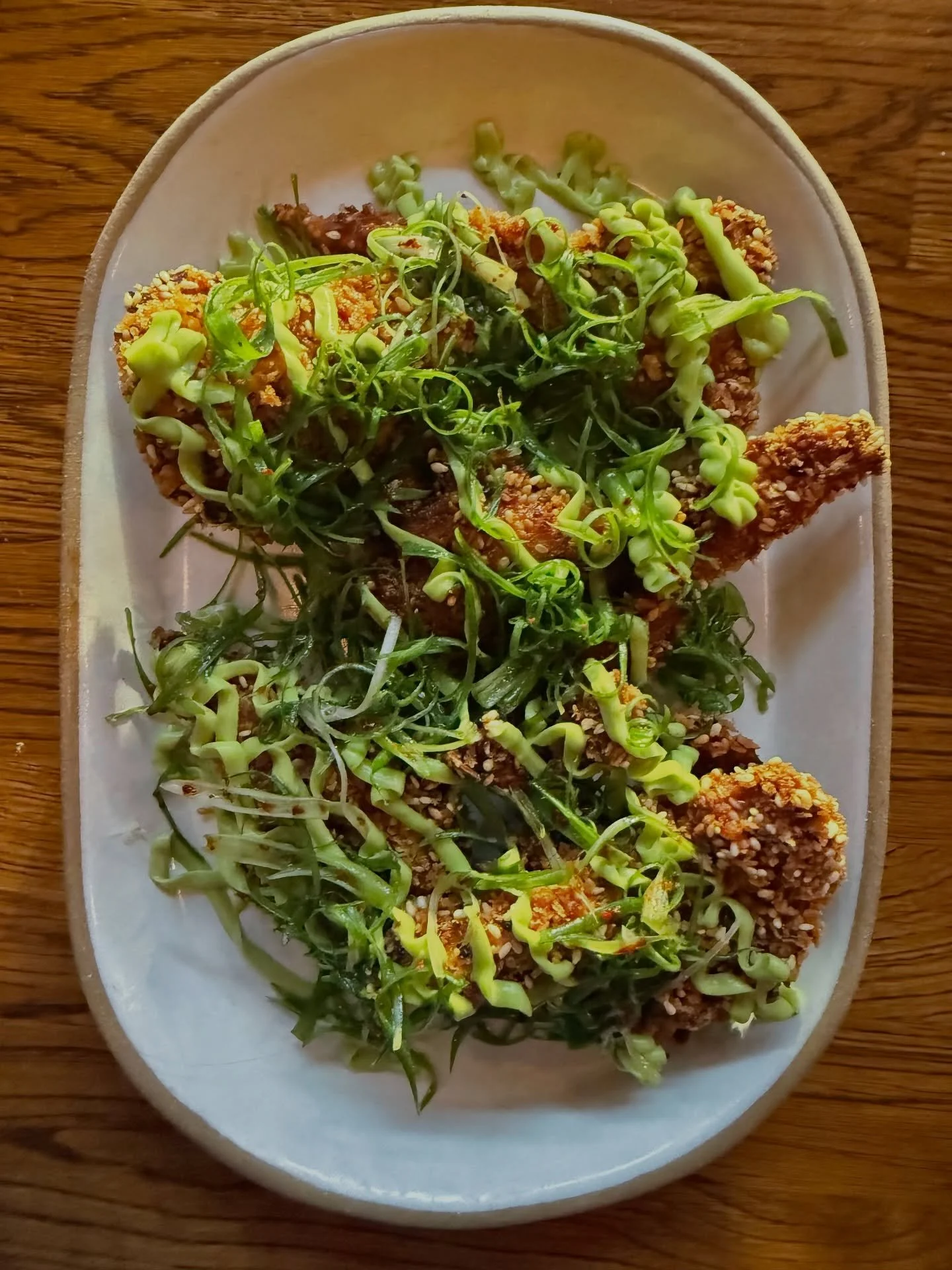 SESAME FRIED MAITAKE
avocado crema / green onion salad

#vegetarian #stoneburnerseattle #maitake #seattle