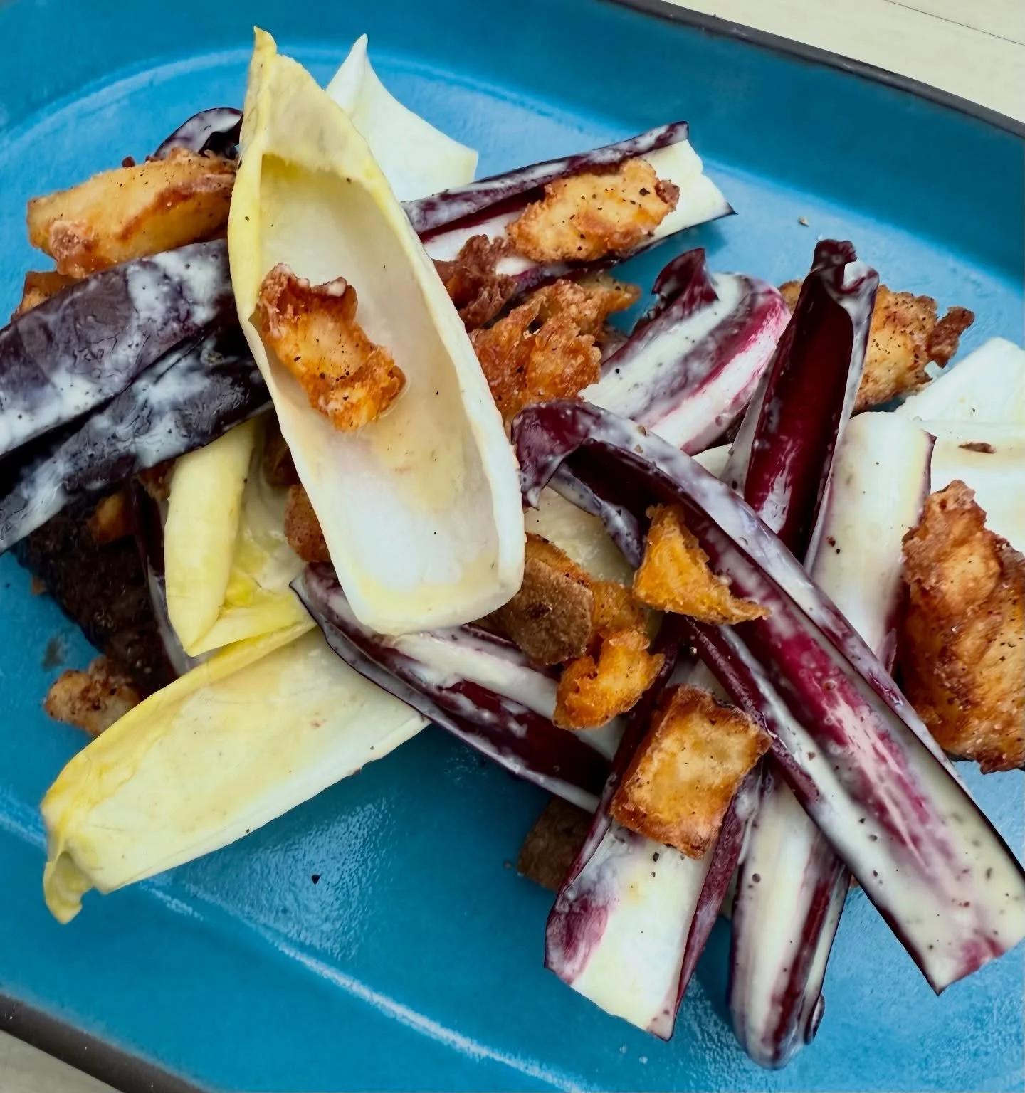 Beautiful piles of tardivo from our friends at @deartablefarm and endive is from @vissersendivessilverton farm in Oregon. New crispy salad, #nowserving.

#stoneburnerseattle #thankafarmer