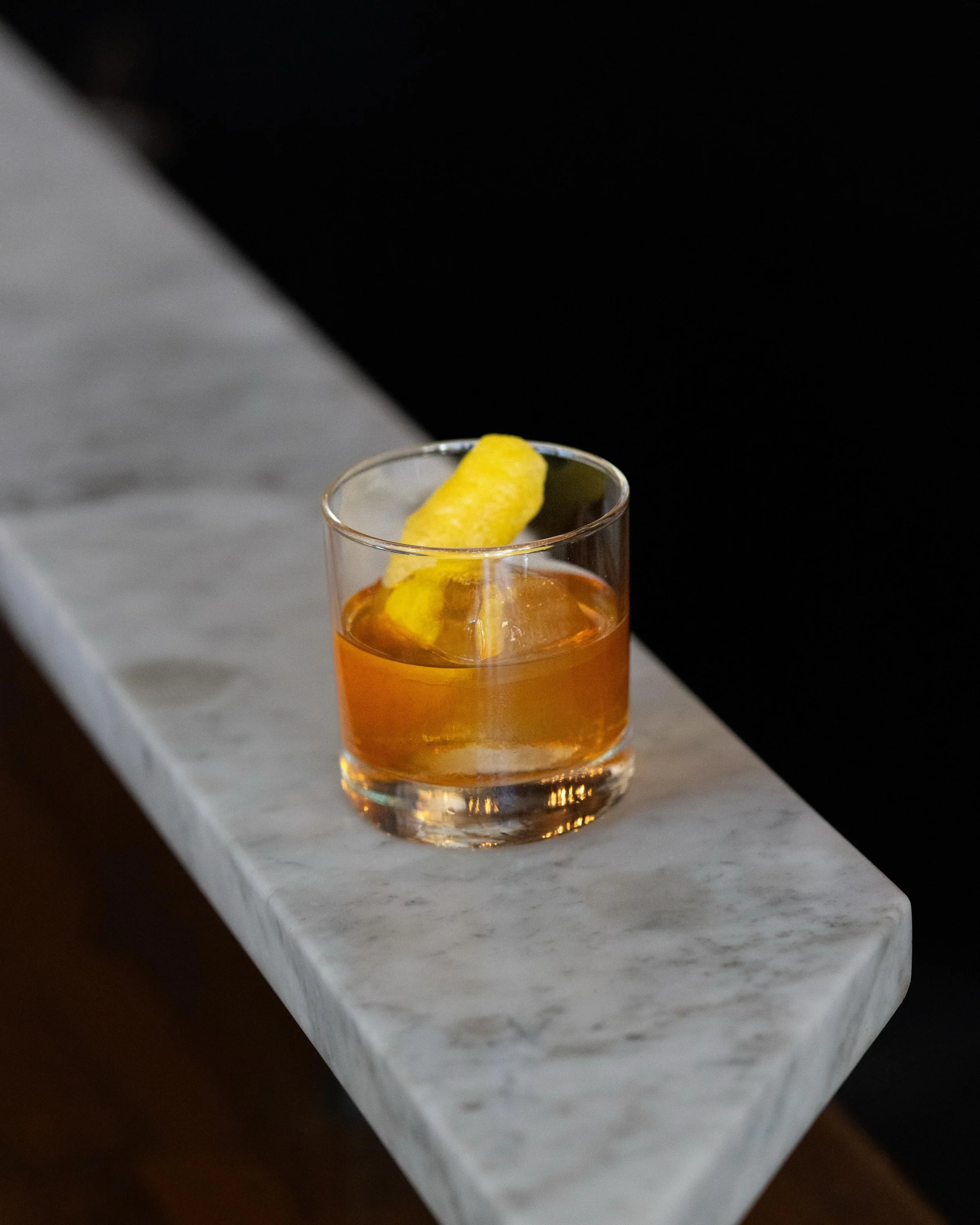 The produce is coming on strong (much like a stirred cocktail), and there may not be a better idea besides walking into Stoneburner and tasting through the new menu items, one dish at a time. 

If you DO walk in, we usually keep a few spots at the ba