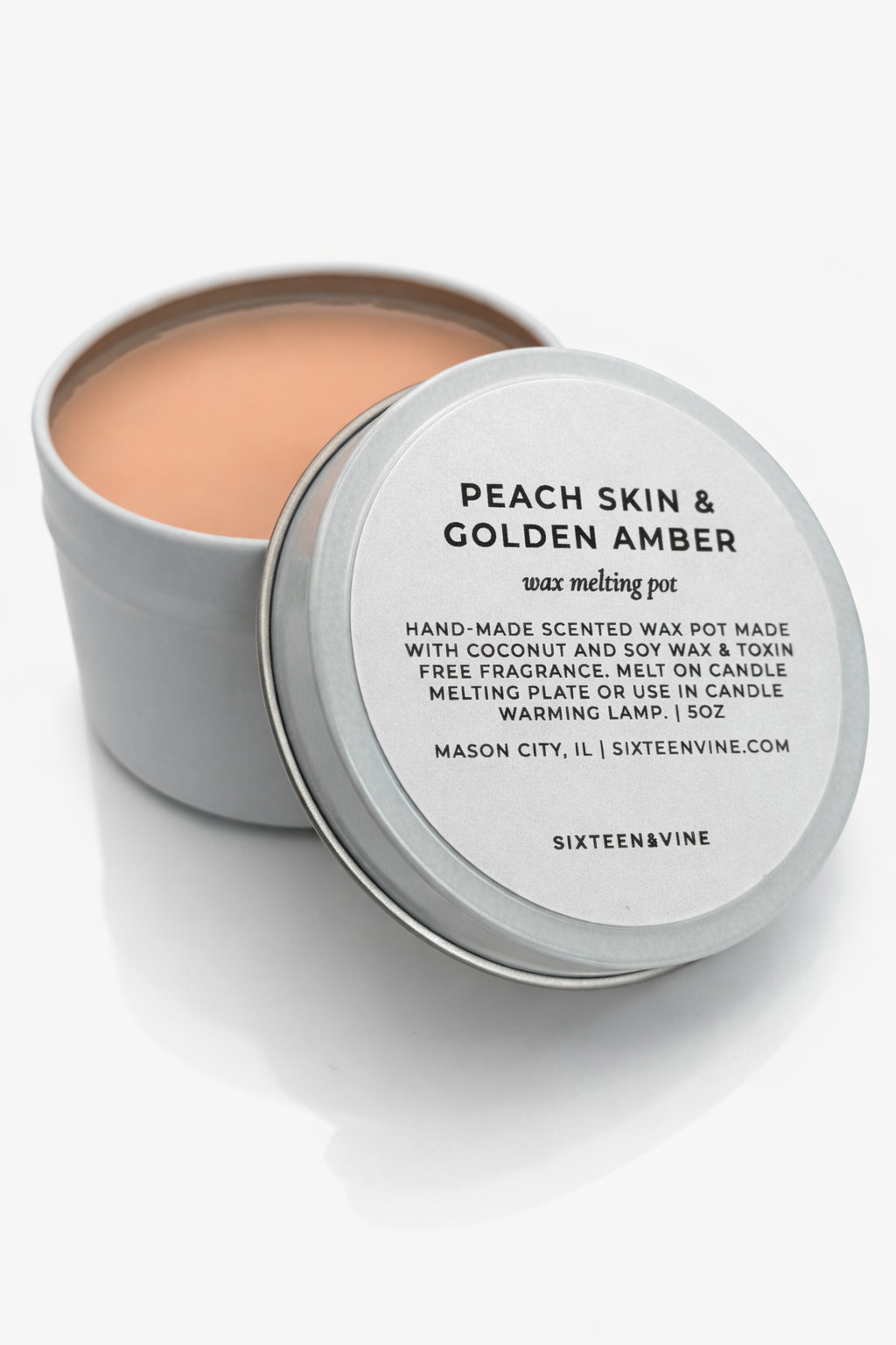 Peach skin and golden amber wax pot.png