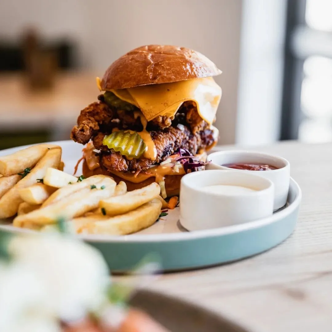 How's this for a burger 🙌🏼 crispy buffalo fried chicken, herb slaw, chipotle mayo, pickles and fries