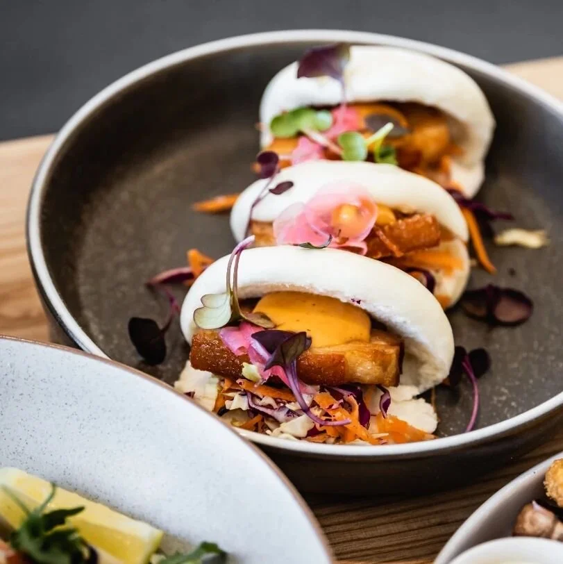 Did you know that we have a delicious snack menu for the times where you feel like a little somethin' somethin' but not a whole meal 👌🏼 these pork belly baos with herb slaw and hoisin dressing are 🙌🏼🙌🏼🙌🏼🙌🏼