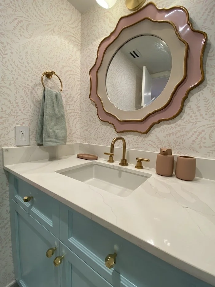 vintage-mirror-pink-monochromatic-bathroom.jpg