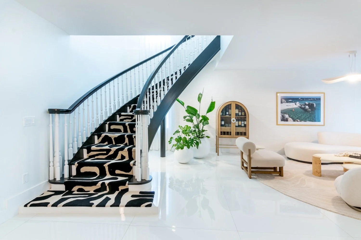 staircase-black-white-rug-modern-organic-neutral-living-room.jpg