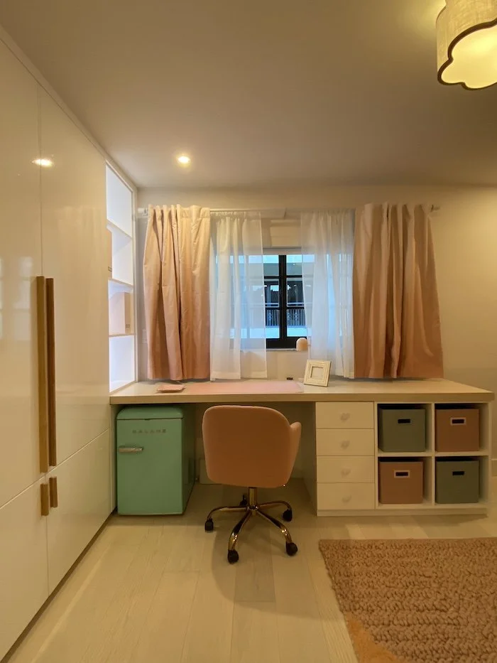 girls-bedroom-pink-desk-chair-window.jpg