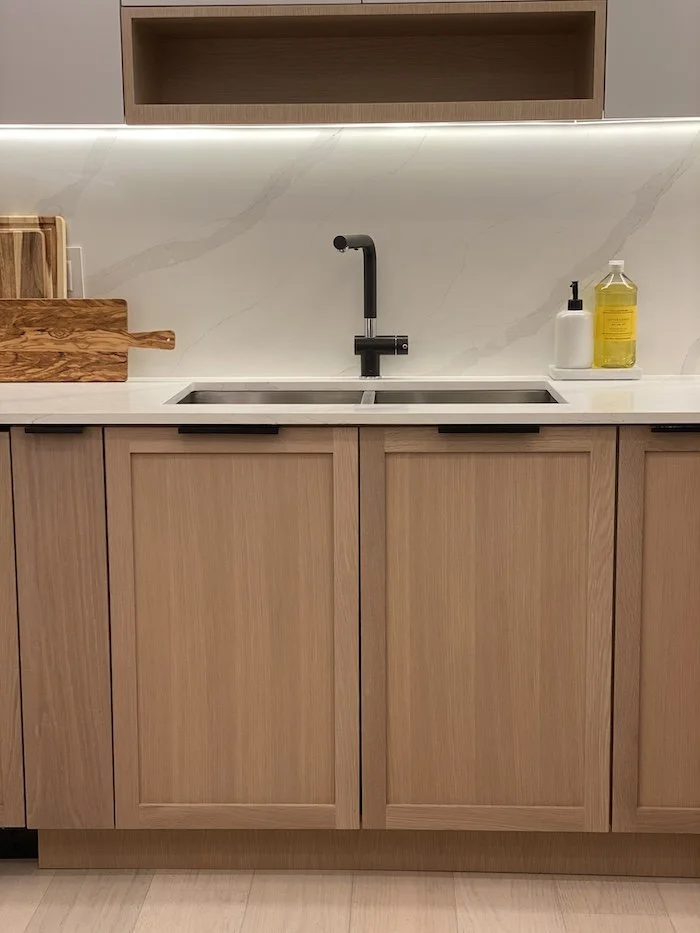 modern-kitchen-sink-natural-bottom-cabinets.jpg