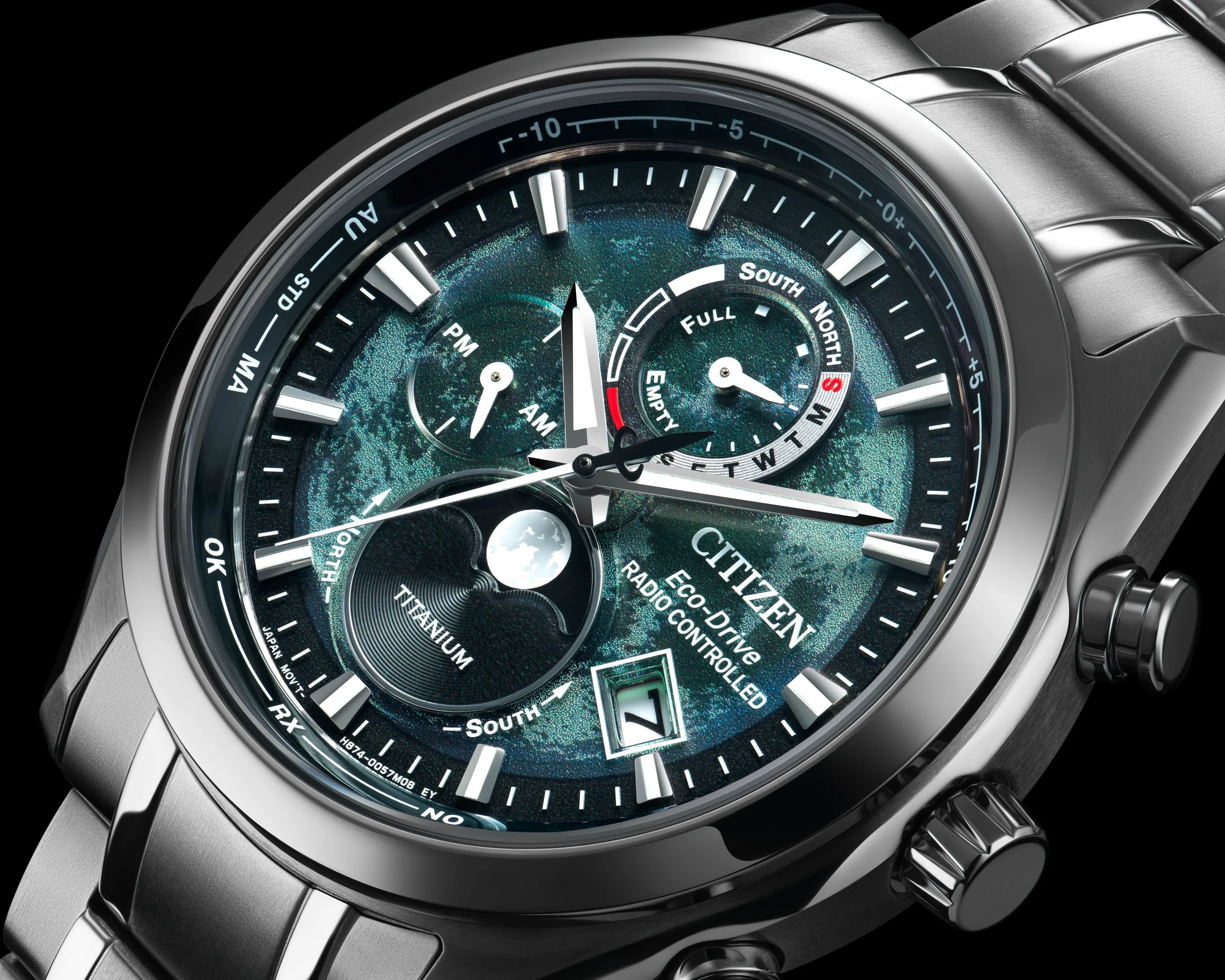 Close-up of a Citizen Eco-Drive Titanium watch with a digital and analog display, showing time, date, and various dials, with a detailed celestial-themed watch face.