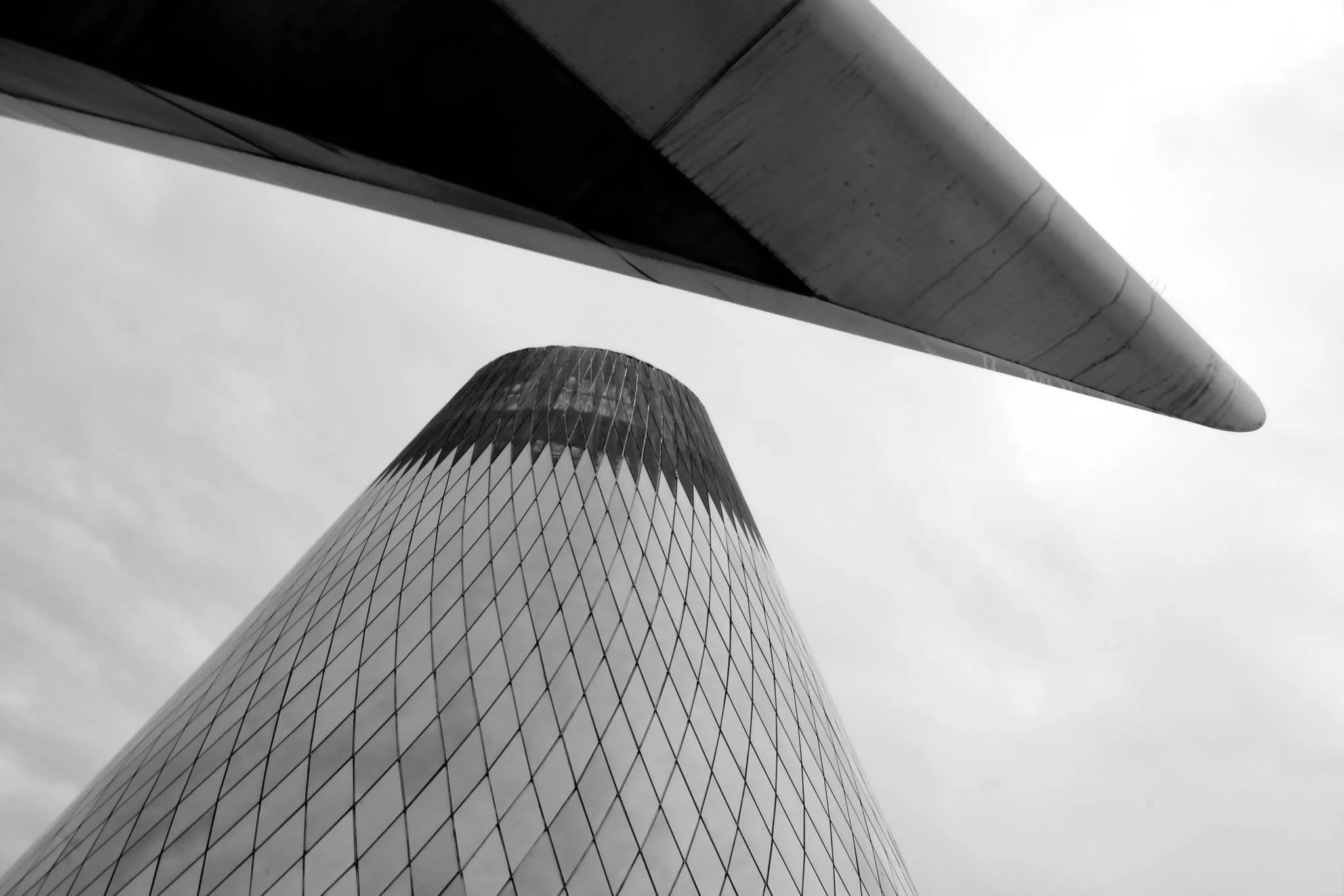 Geometry of Glass and Steel. A meditation on minimalism in industrial design; light and reflection colliding to construct a rigid, crystalline plane.