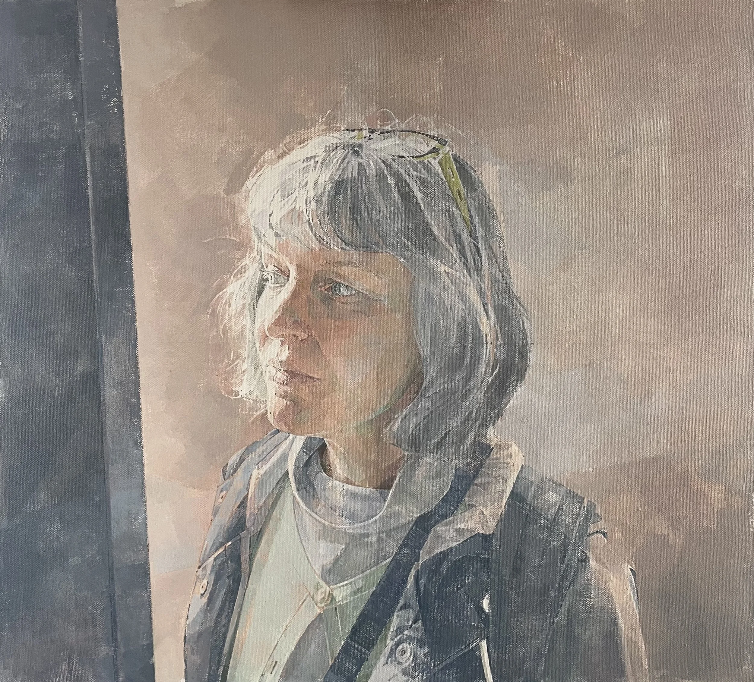 Portrait of a woman looking thoughtfully out of the window