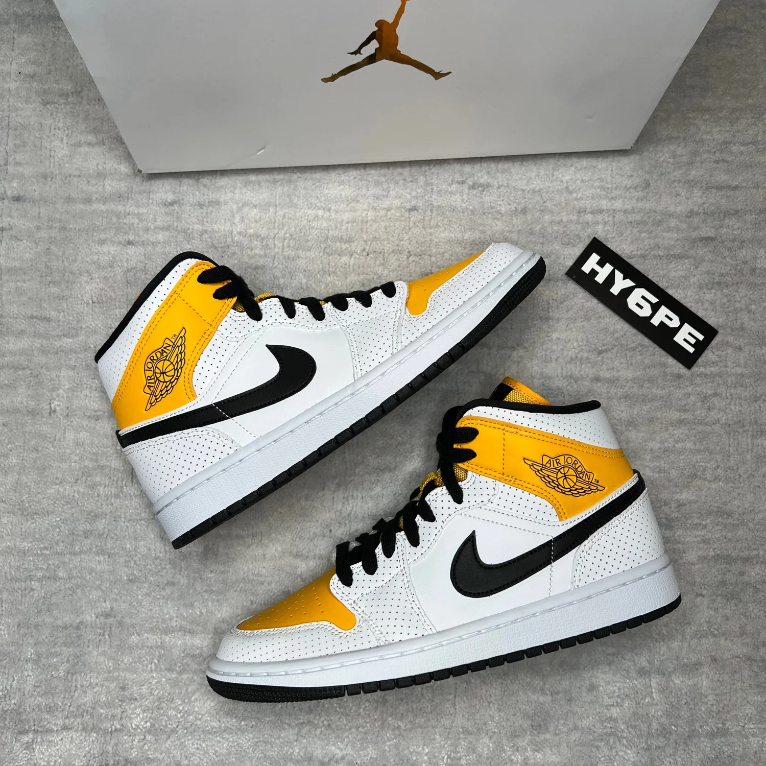 Jordan 1 Mid Perforated Yellow Gold br University Gold