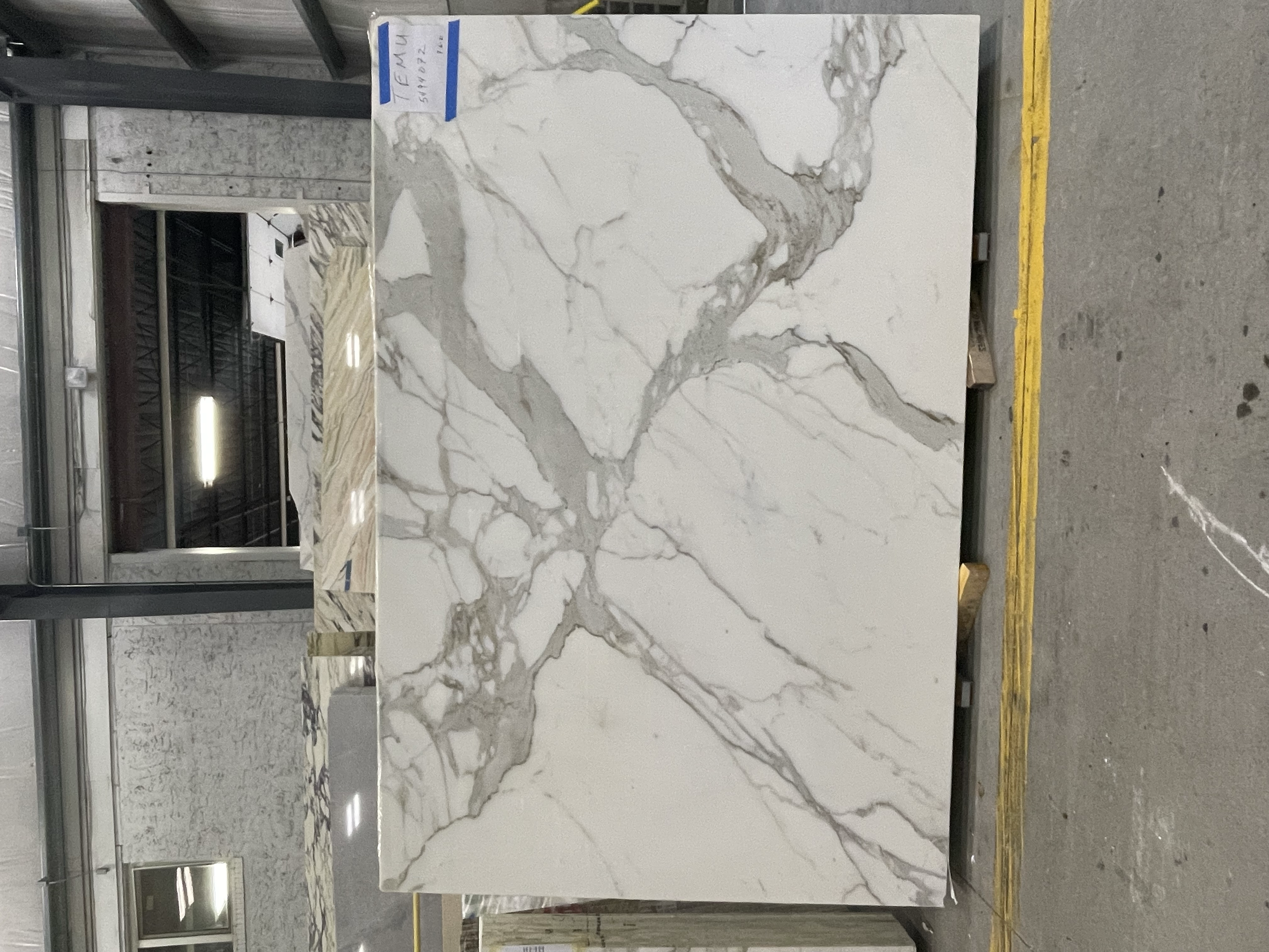 at slab yard selecting stone for counters, backsplash and shelves
