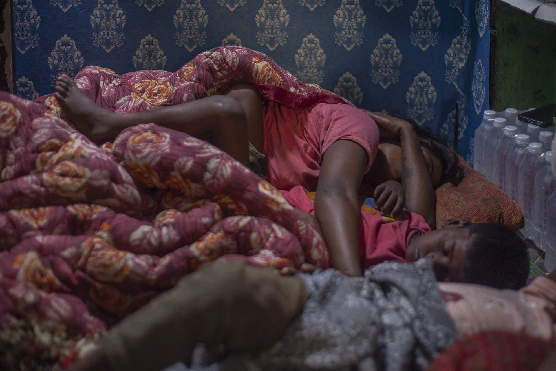 mother and children sleeping