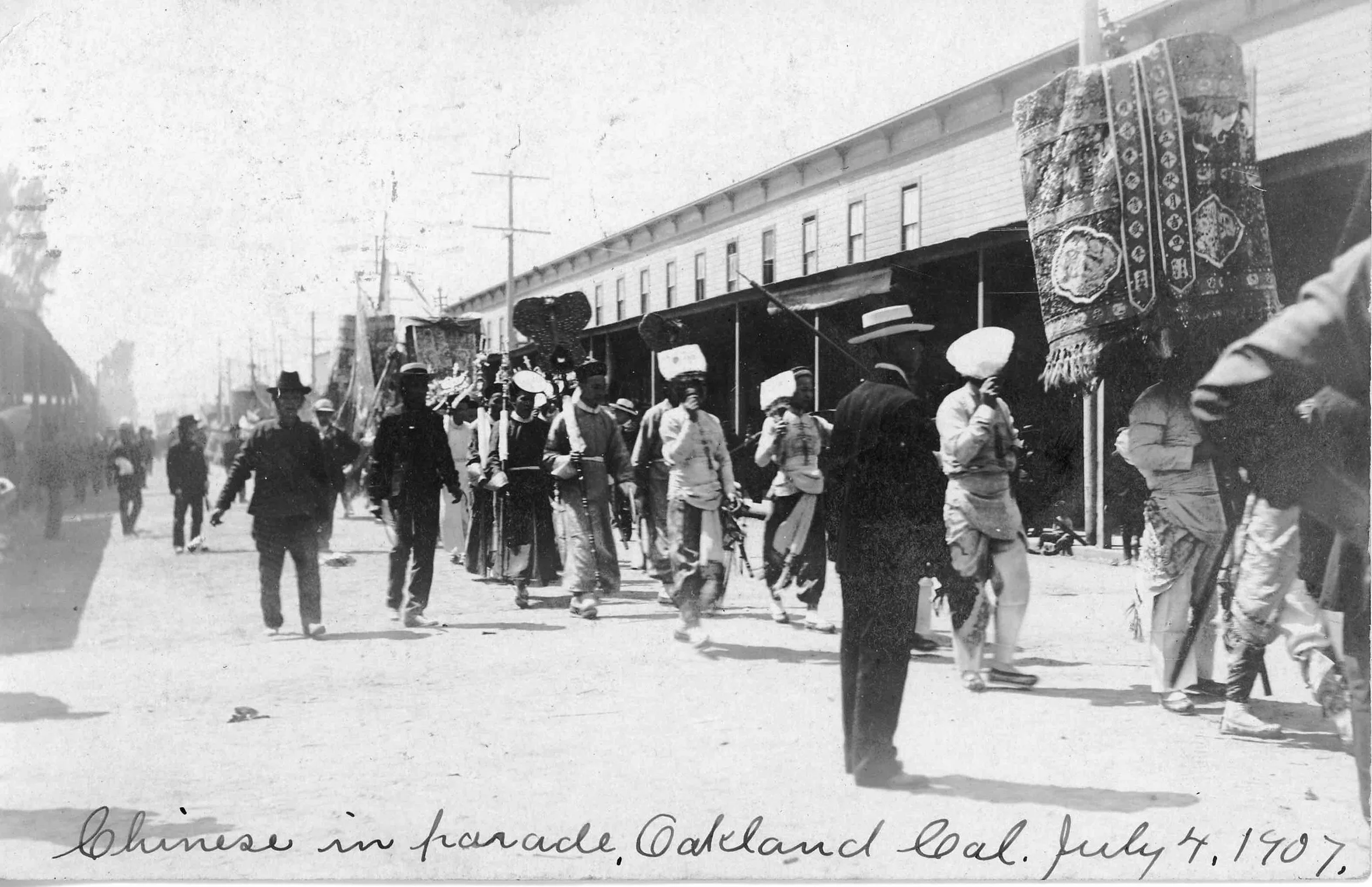 1907 postcard of an early Oakland Chinese parade on Fourth of July (Courtesy of Ed Clausen)
