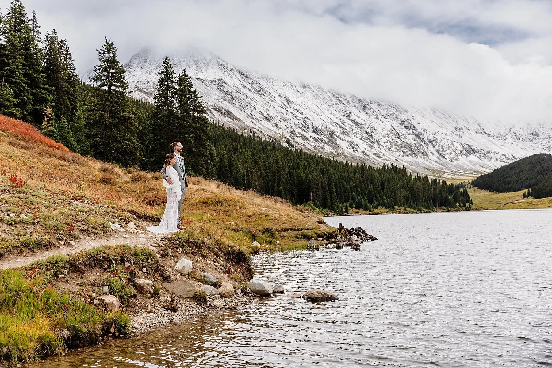 Snowy elopement at an alpine lake