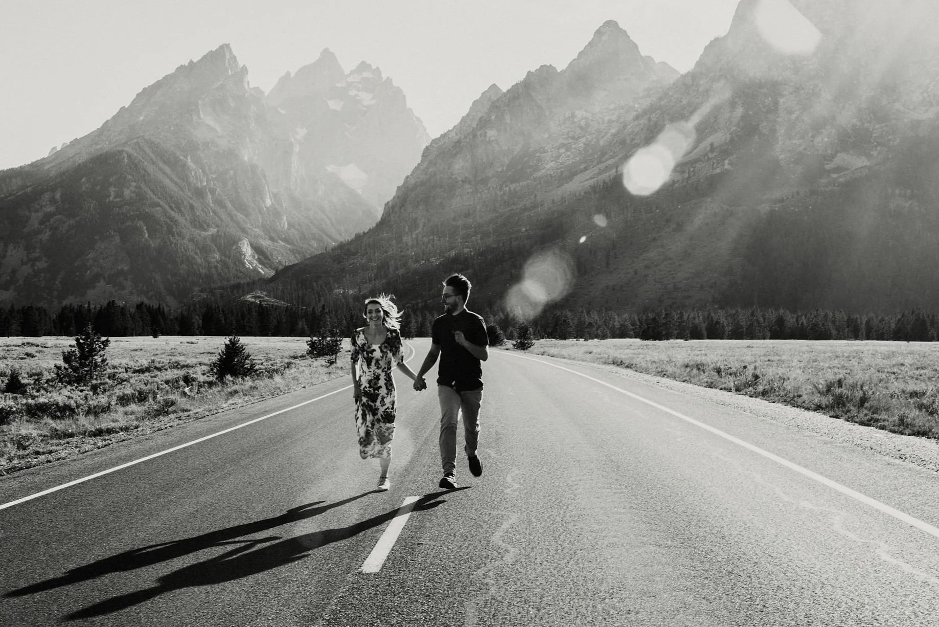 Lisa and Alex run down a road together