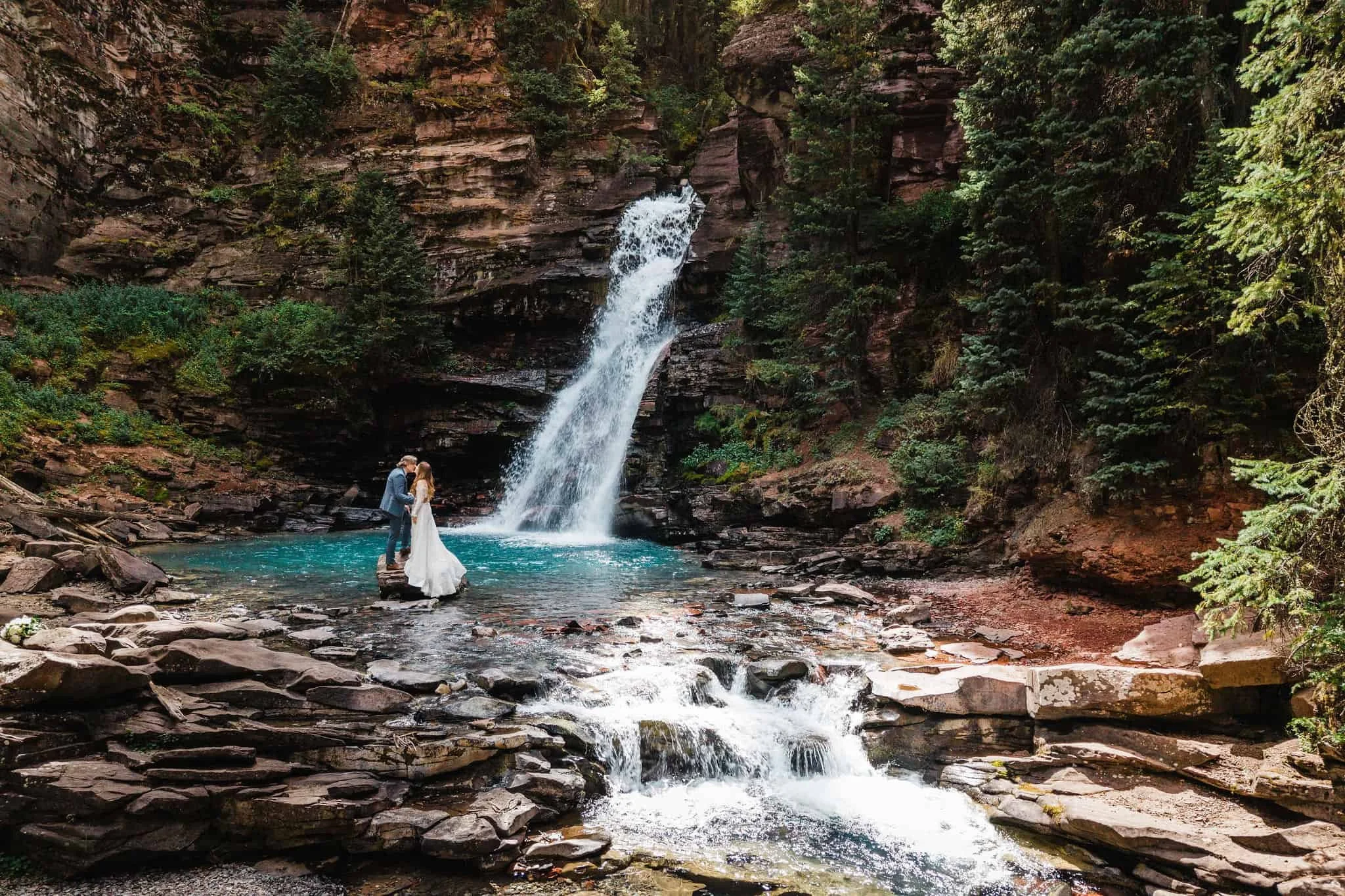 Elopement at a blue waterfall in Colorado