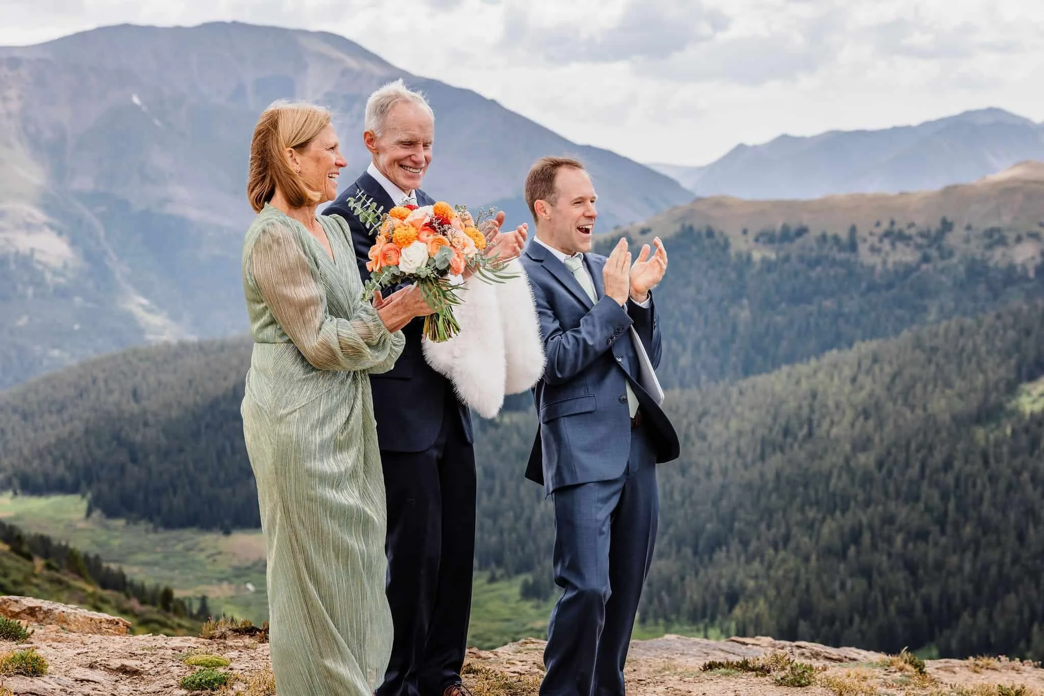 Family cheers during an elopement ceremony