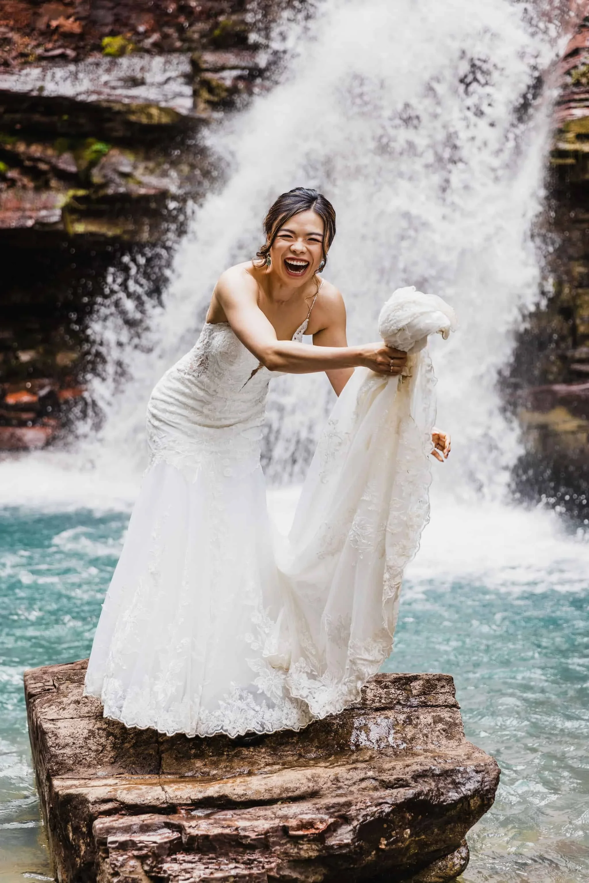 Bride at a waterfall elopement in Ouray
