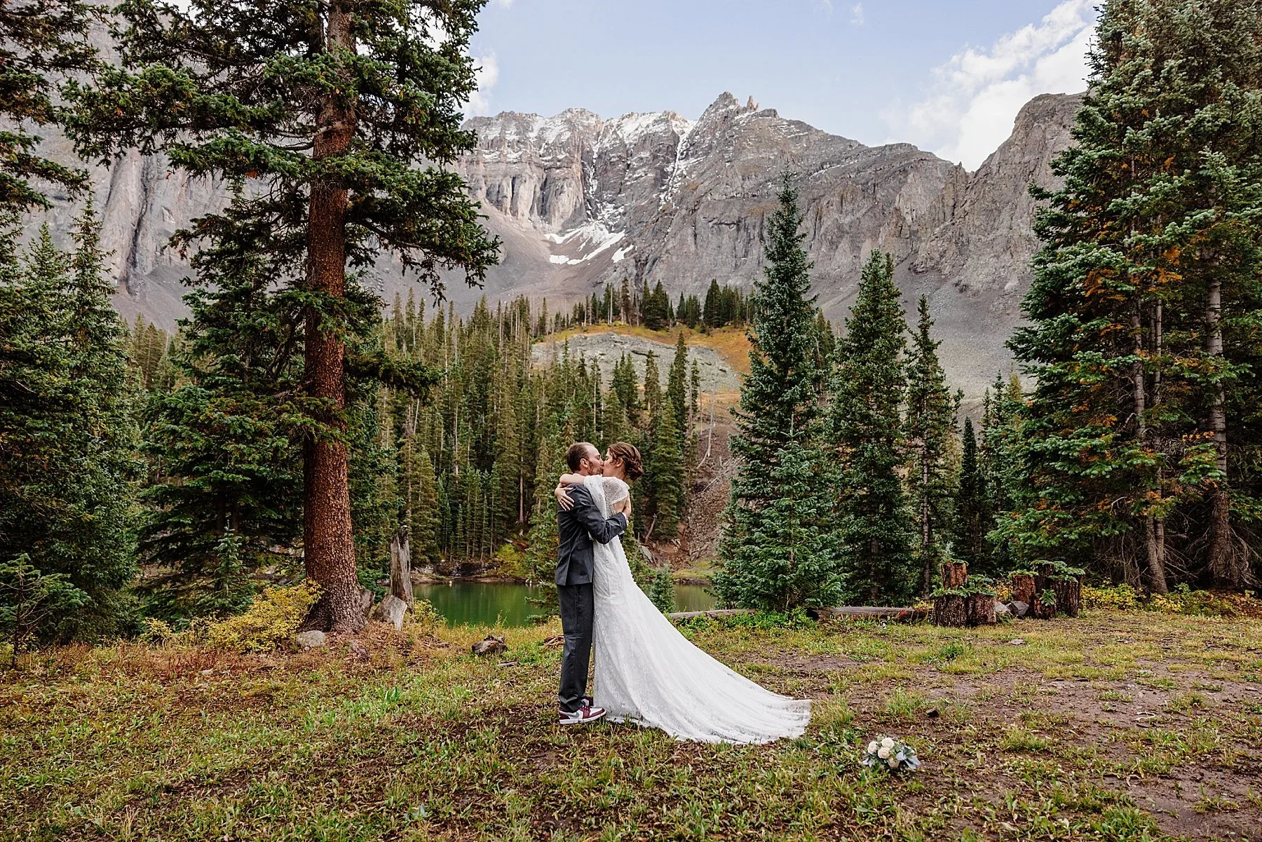 Elopement ceremony with forest and mountains