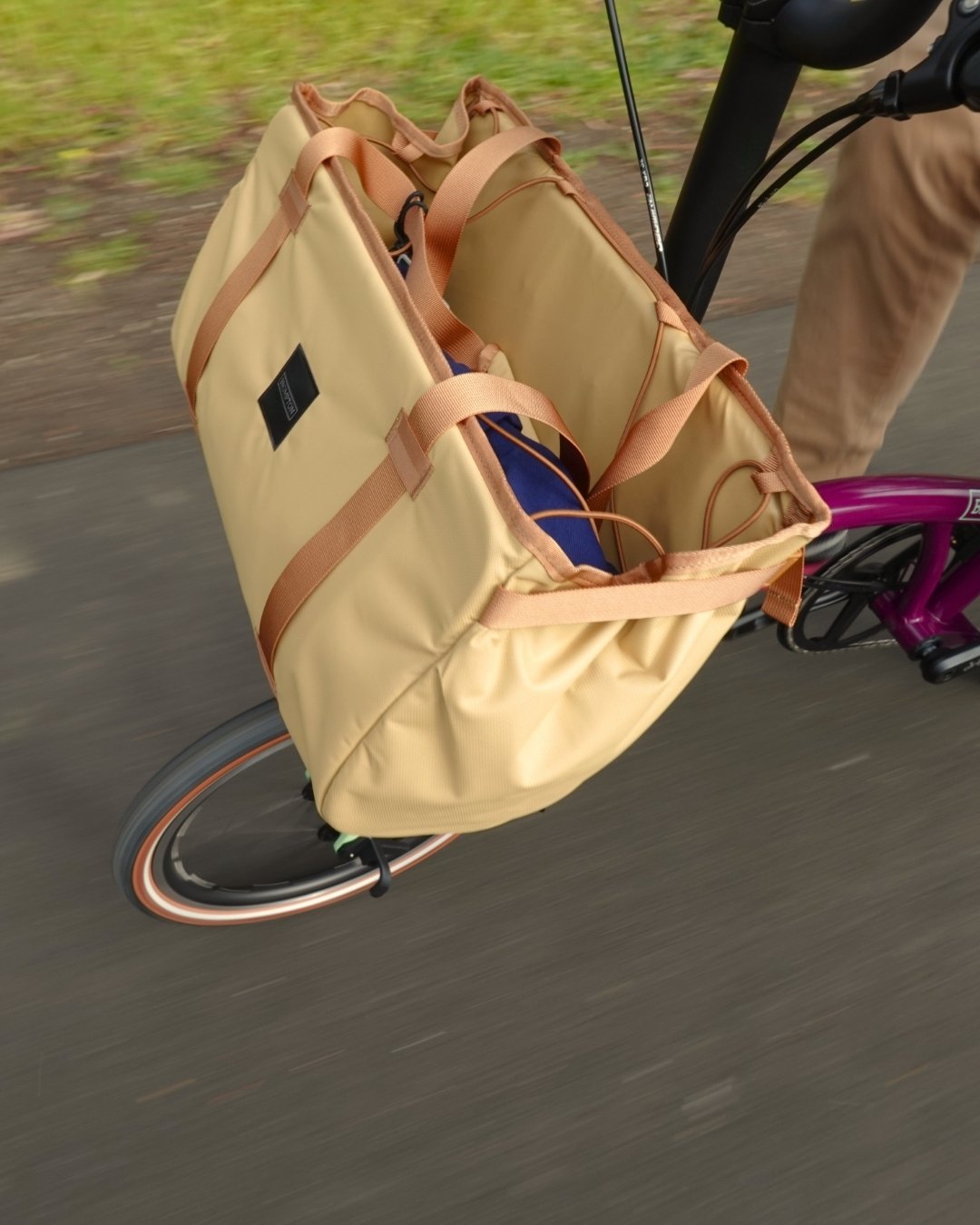 New Bags! The classic Brompton basket bag has been updated with new colours, new materials, and new sizes. 

Now made of highly durable recycled nylon. The bags come with a built-in cargo net to keep you shopping safe. 

A new smaller 10 litre size i