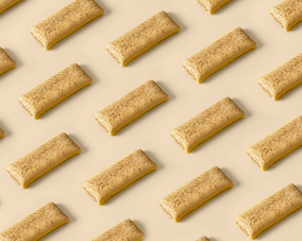 Pattern of nutrition bars on tan background.