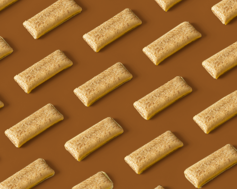 Pattern of nutrition bars on brown background.