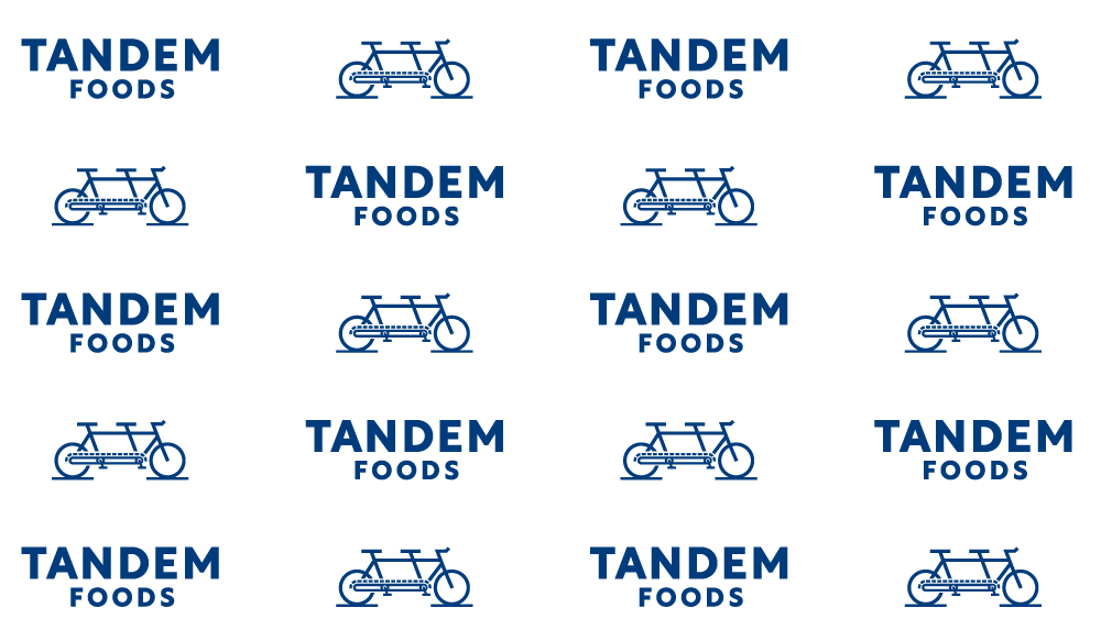 Blue and white pattern with Tandem Foods and tandem bike artwork.