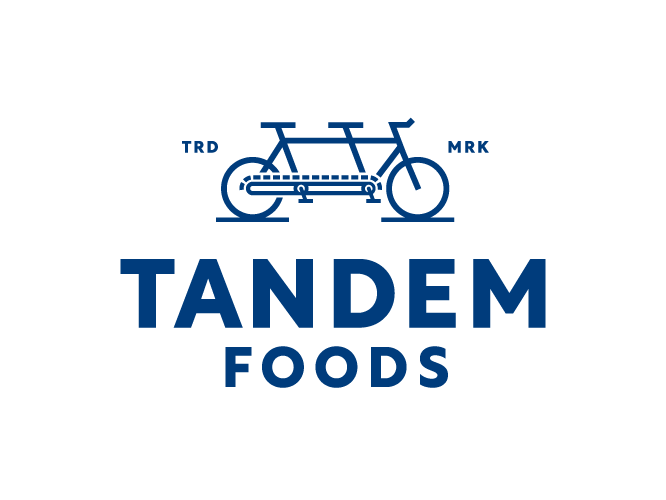 Vertical Tandem Foods logo lockup with blue bike artwork and type on white.