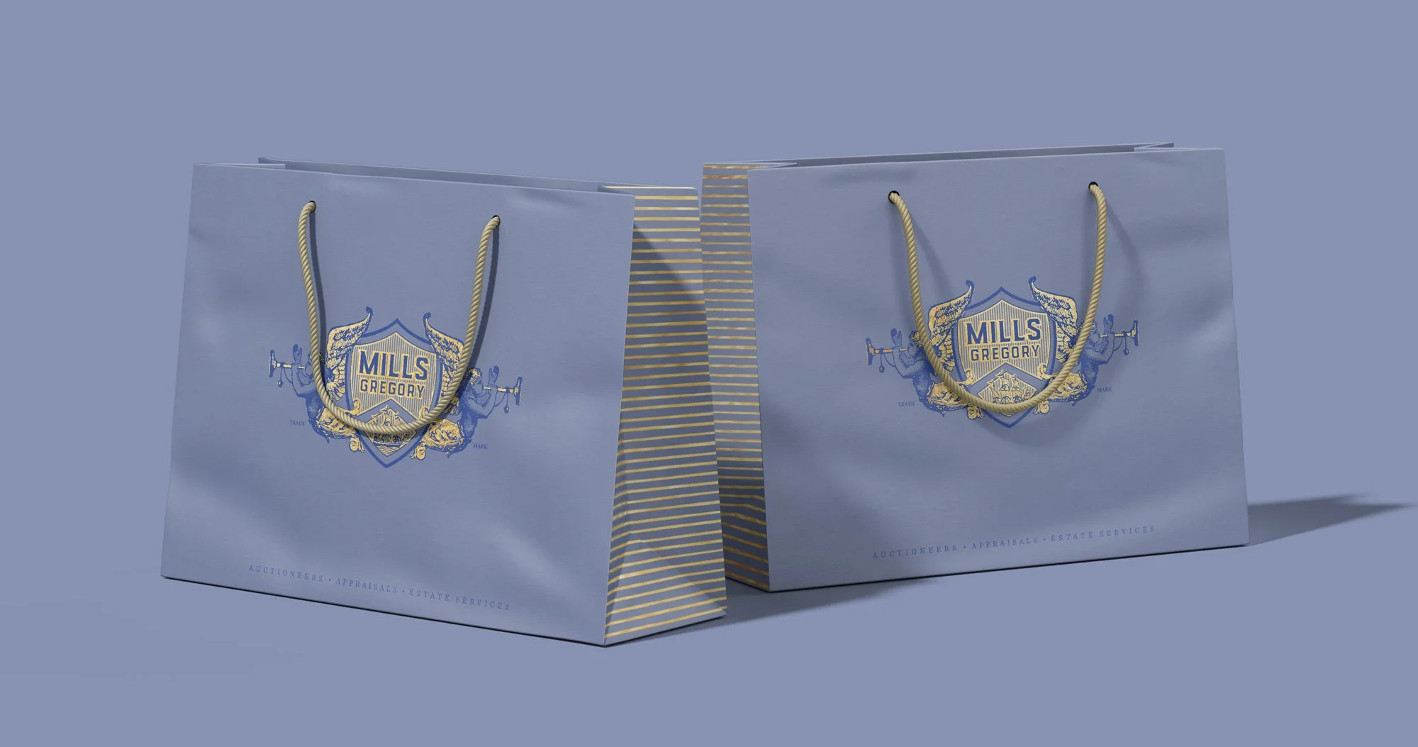 Blue and gold Mills-Gregory luxury paper shopping bag.