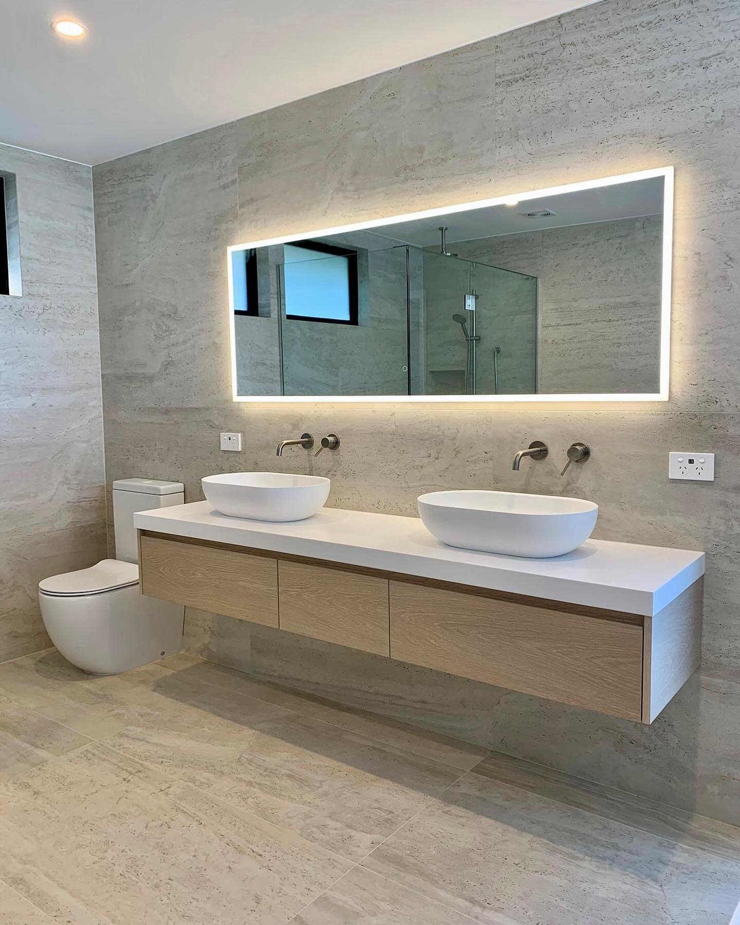 Working closely with the customer is essential for any project, big or small.

We helped our clients decide on vanity sizing, heights and design for this one. Working along side the electrician also allowed for perfect placement of the LED mirror set