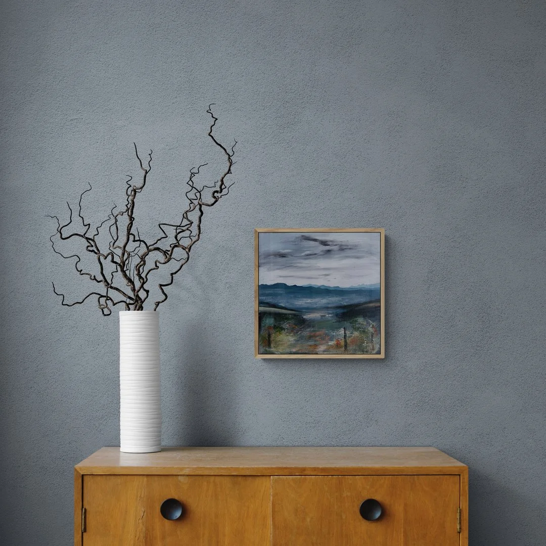 curly-twigs-in-vase-sitting-on-cabinet.jpg