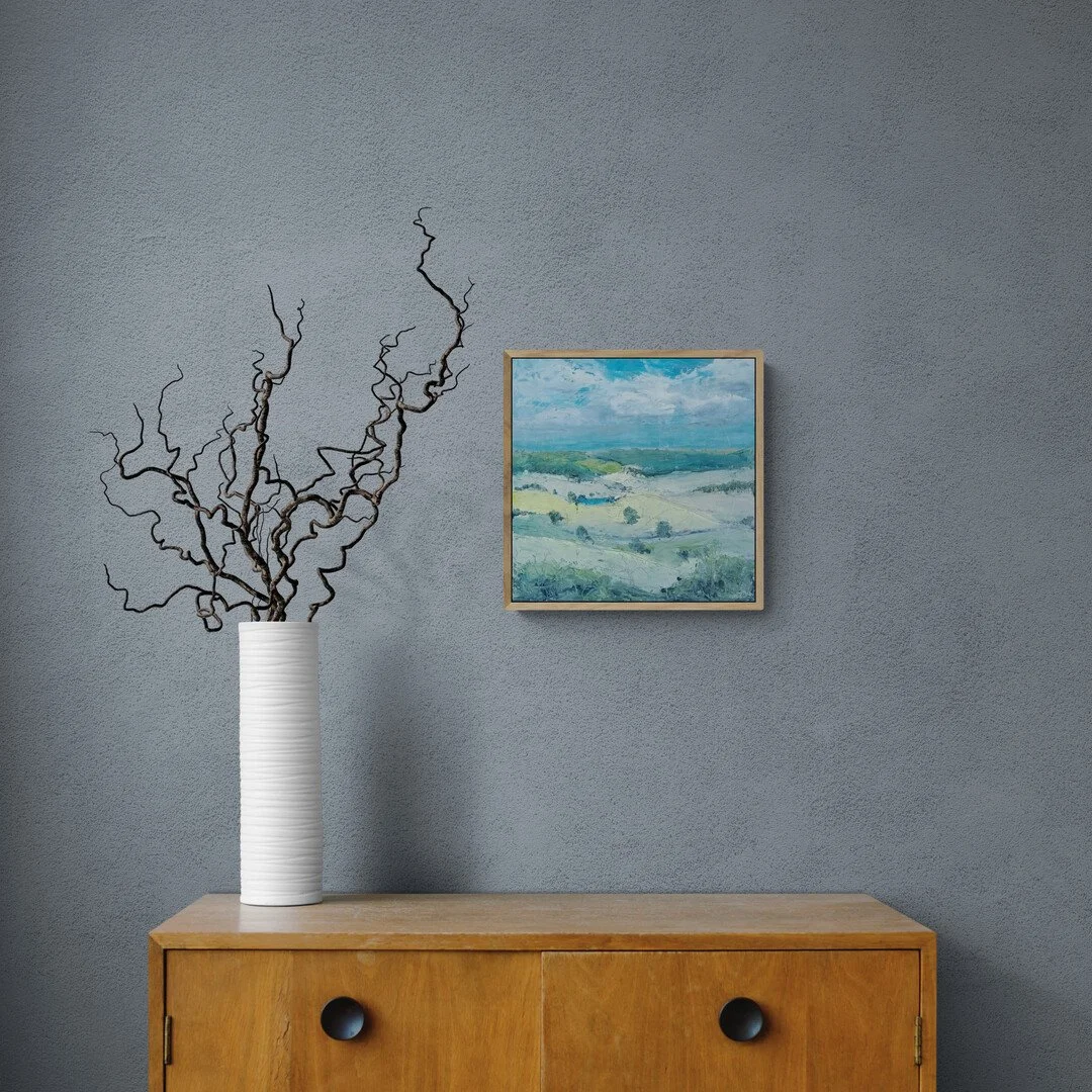 curly-twigs-in-vase-sitting-on-cabinet.jpg