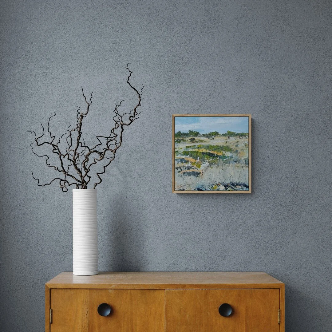 curly-twigs-in-vase-sitting-on-cabinet (1).jpg